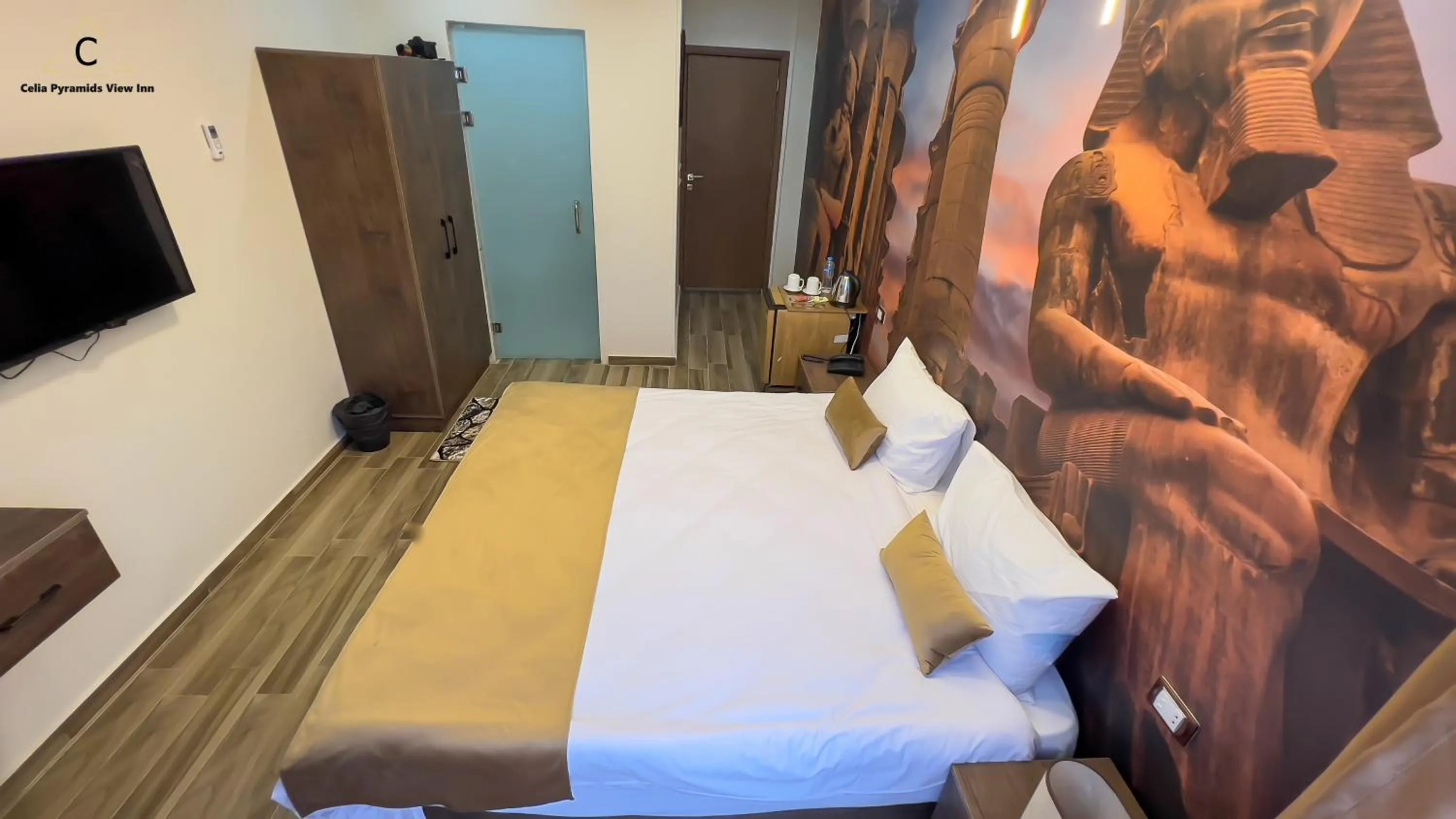 Bedroom, Bed in Celia Pyramids View inn