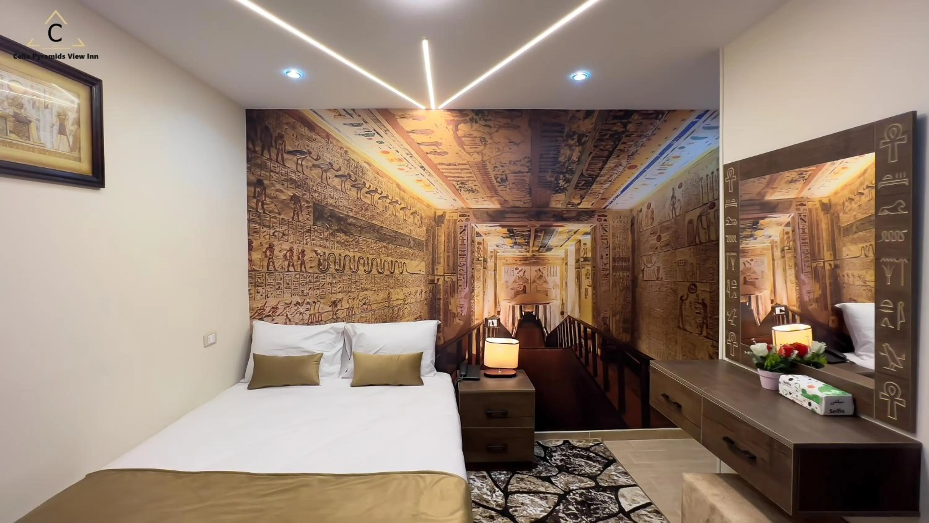 Bed in Celia Pyramids View inn