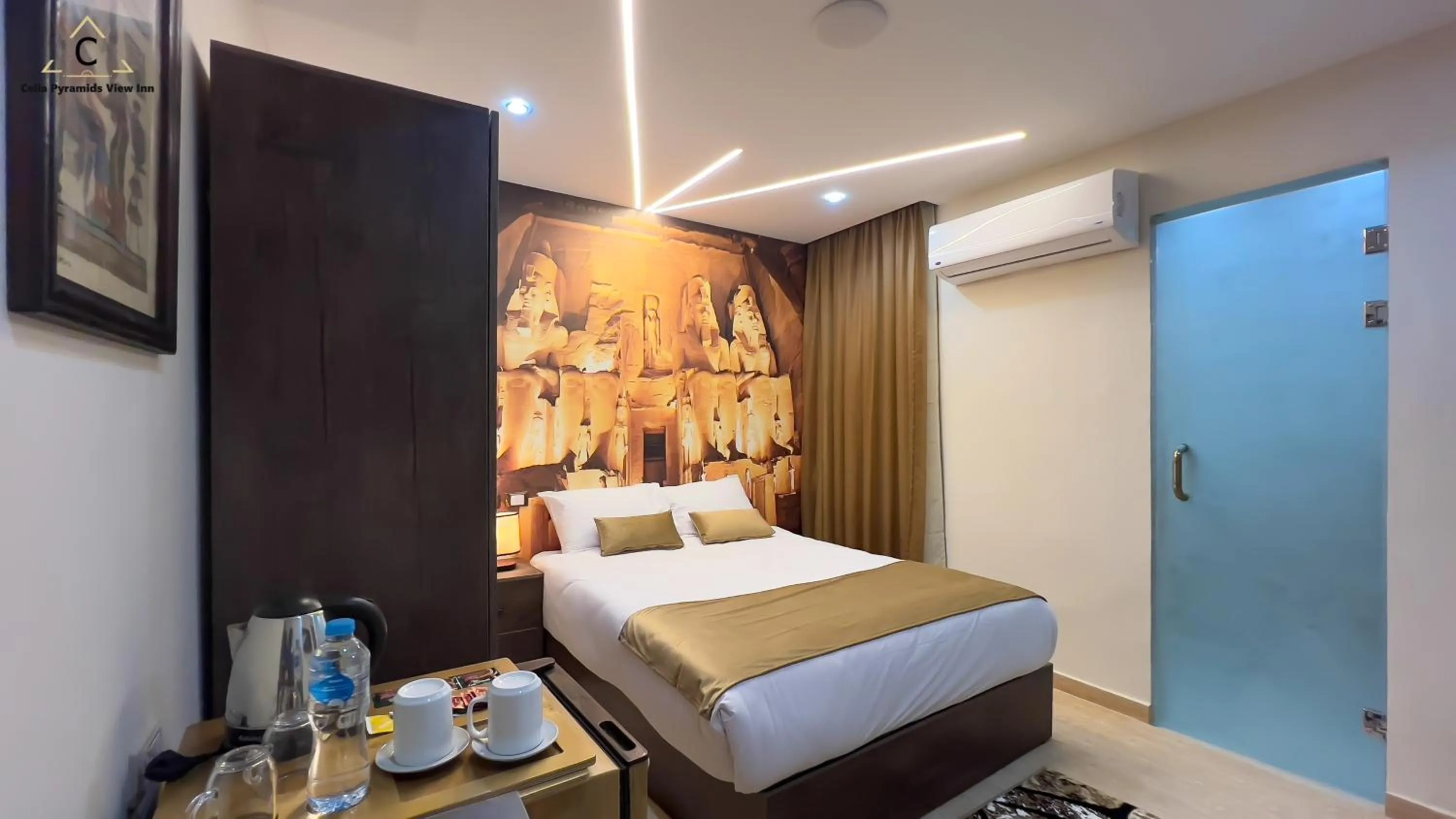 Bed in Celia Pyramids View inn