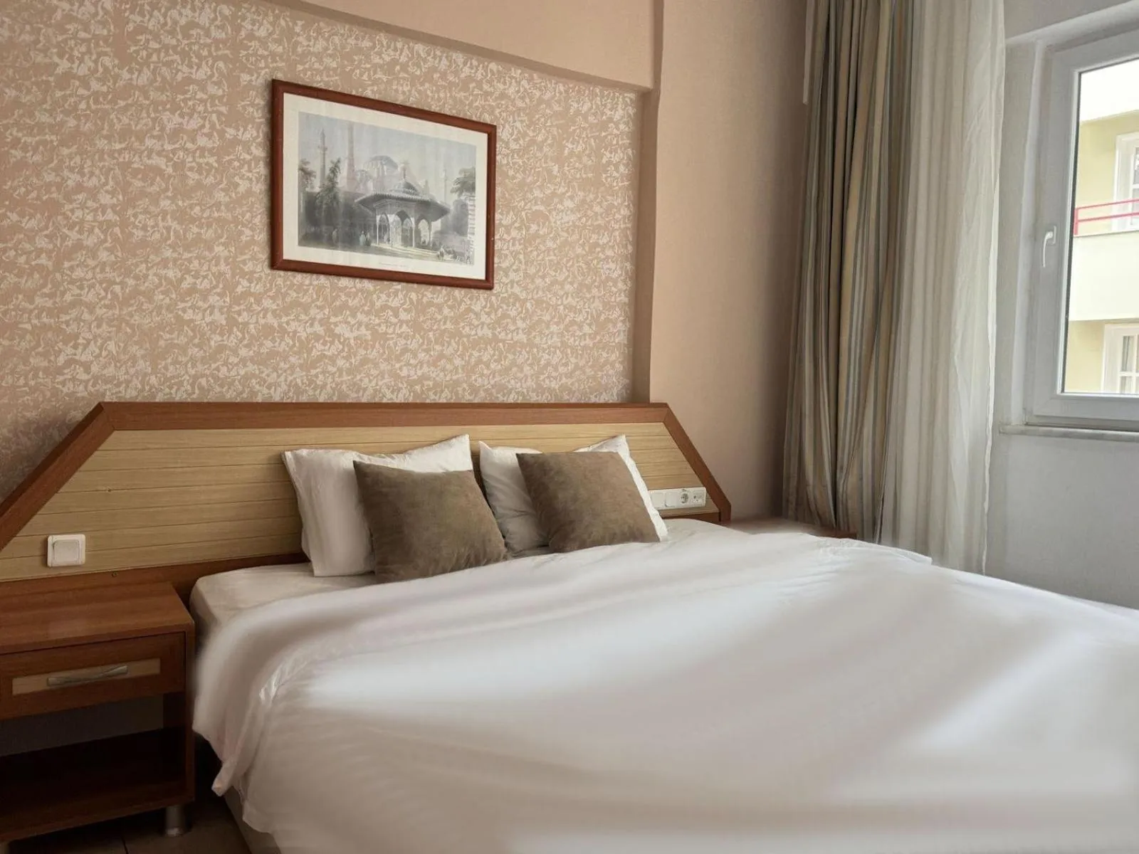 Bed in Agora Apart Hotel