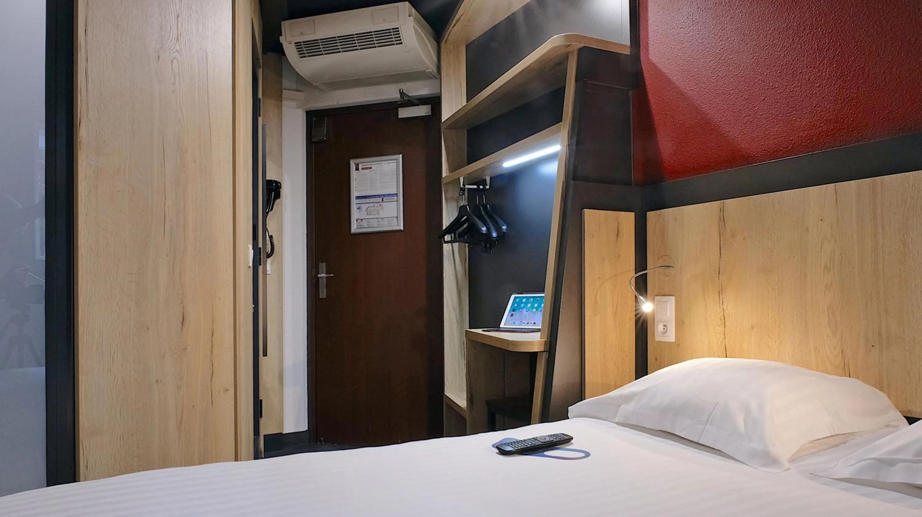 Photo of the whole room, Bed in In Hotel Nancy Frouard