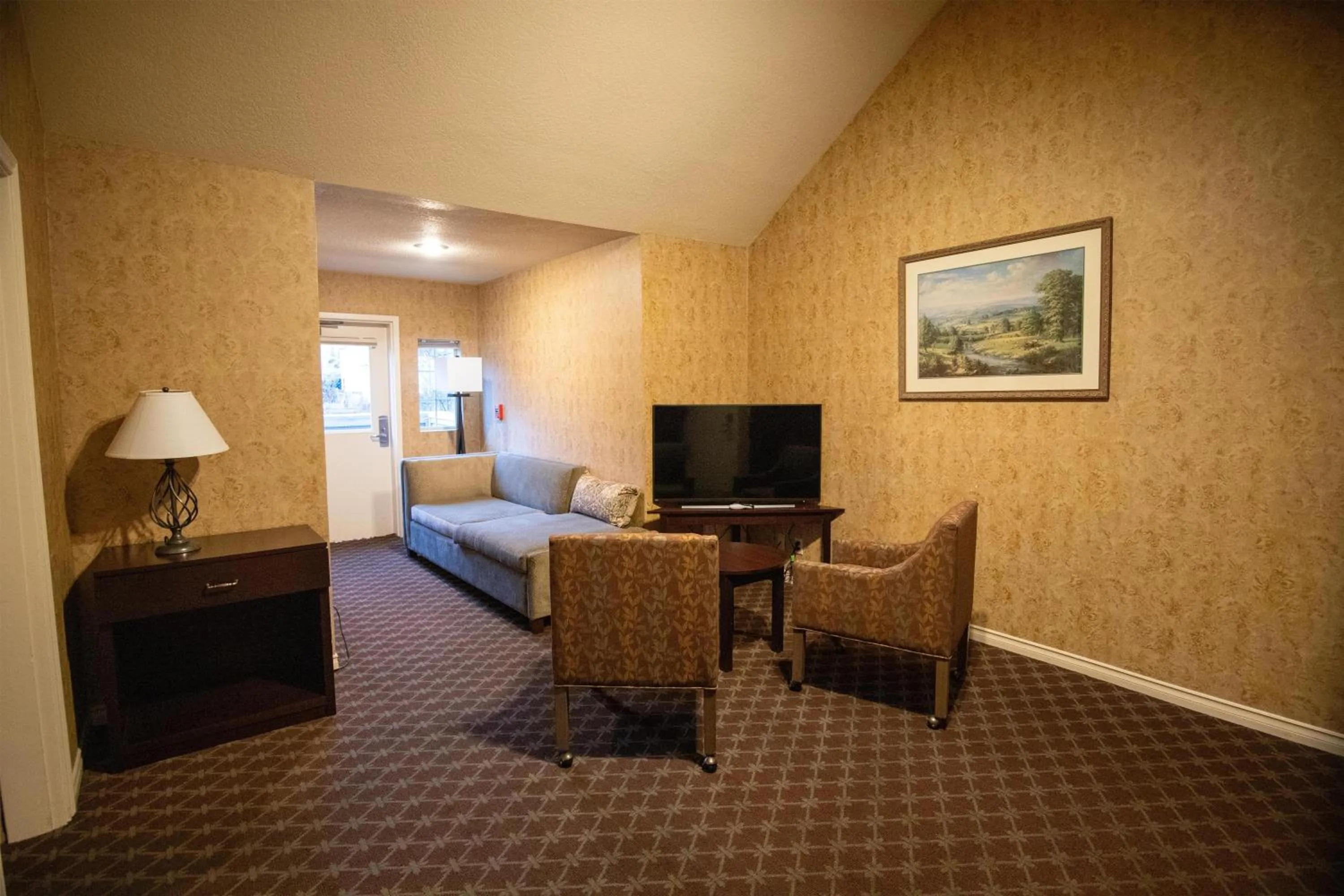 Bedroom in The Bard's Inn - BW Signature Collection by Best Western