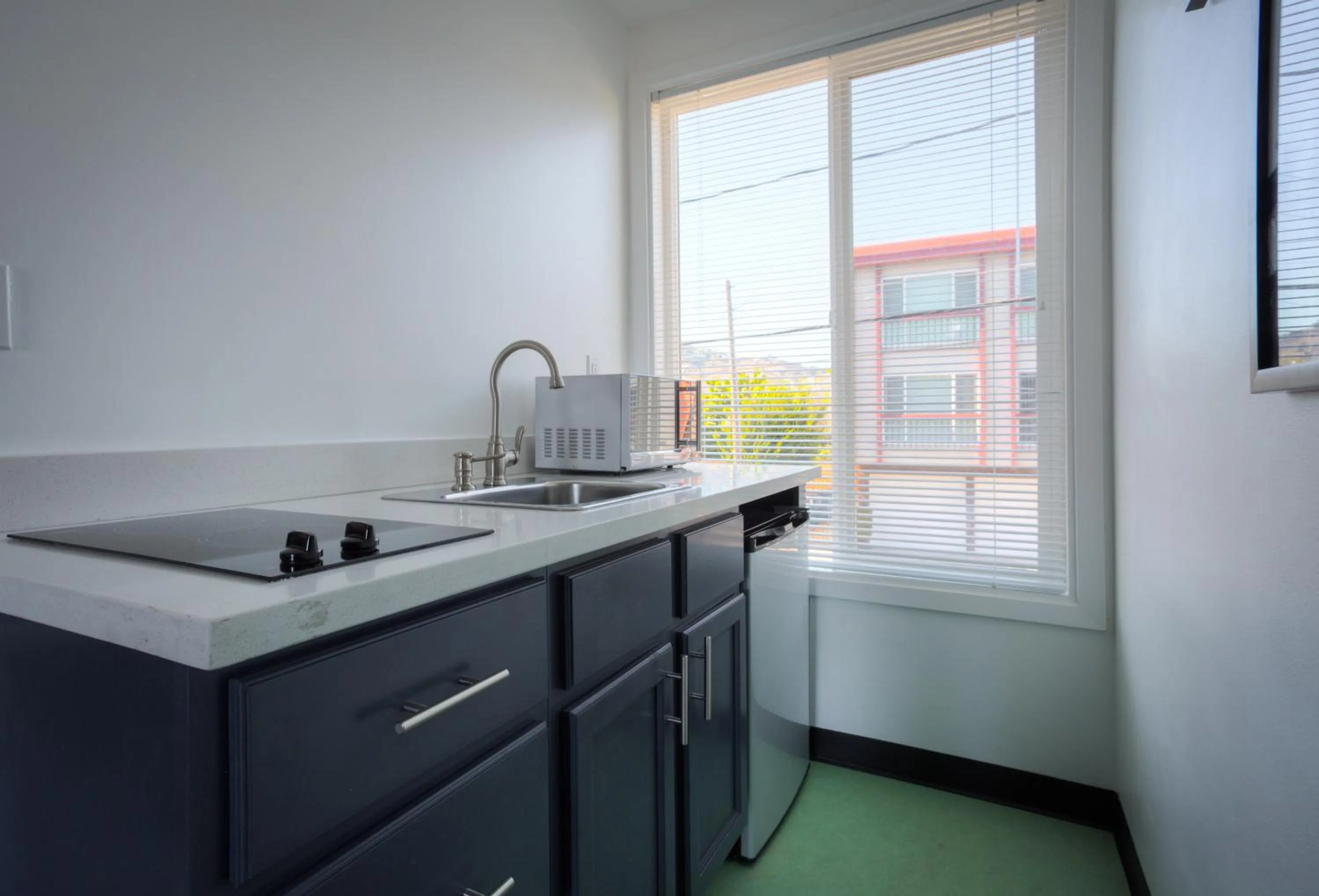 Kitchen or kitchenette in Mylo Hotel