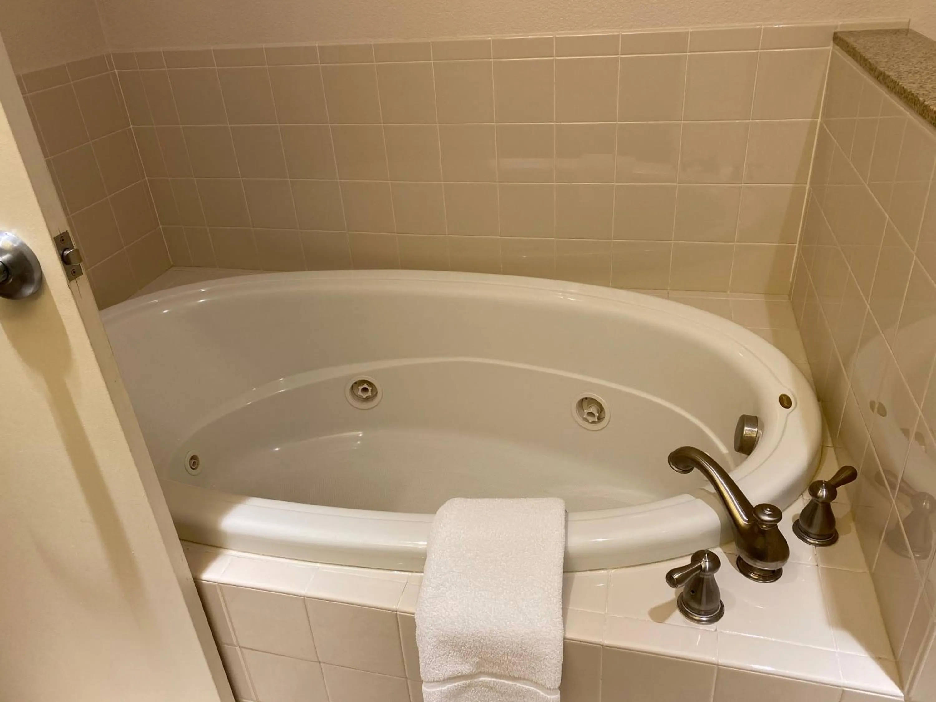 Bathroom in A Riverside Inn Travelodge by Wyndham