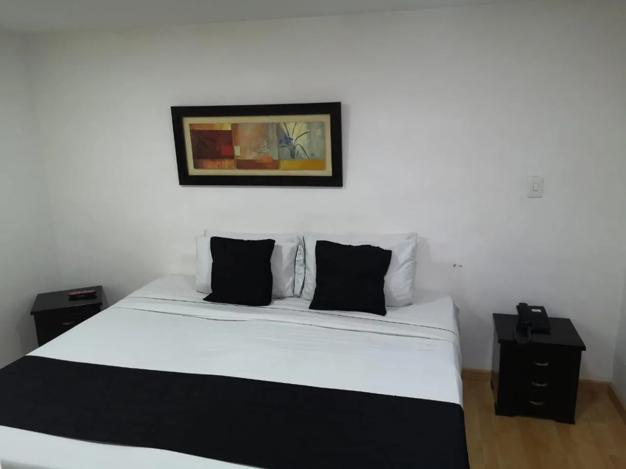 Bed in Hotel Santiago Plaza