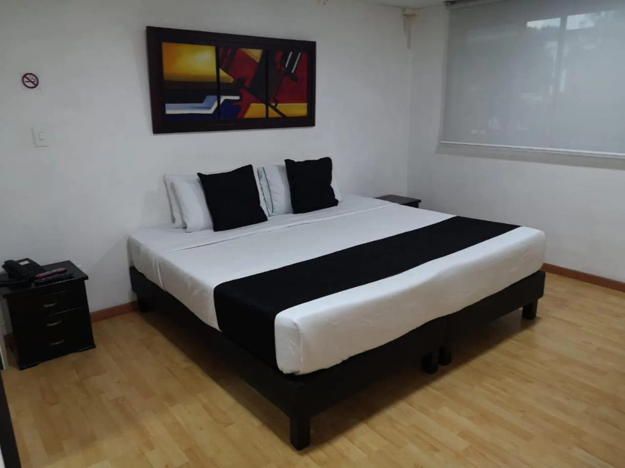 Bed in Hotel Santiago Plaza