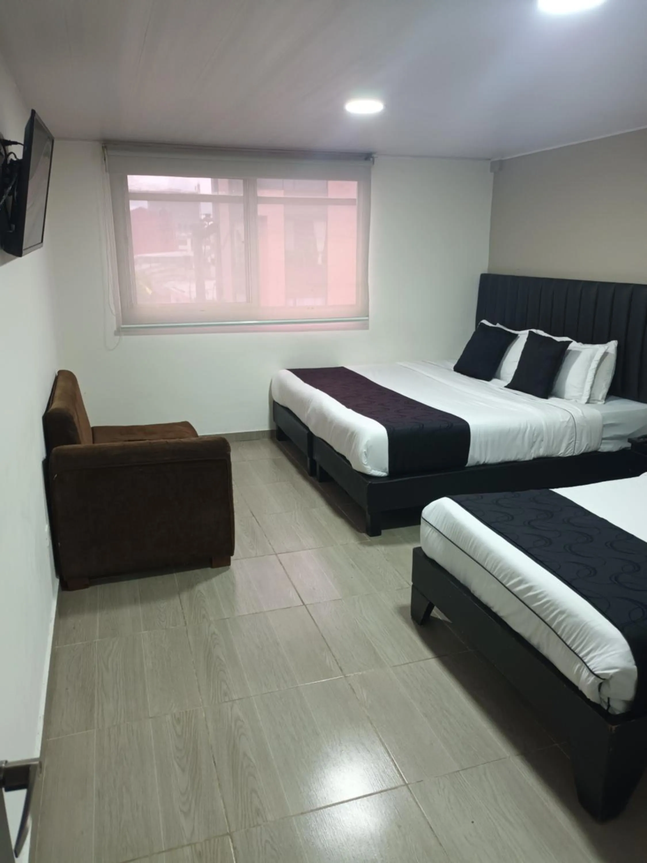 Photo of the whole room, Bed in Hotel Santiago Plaza