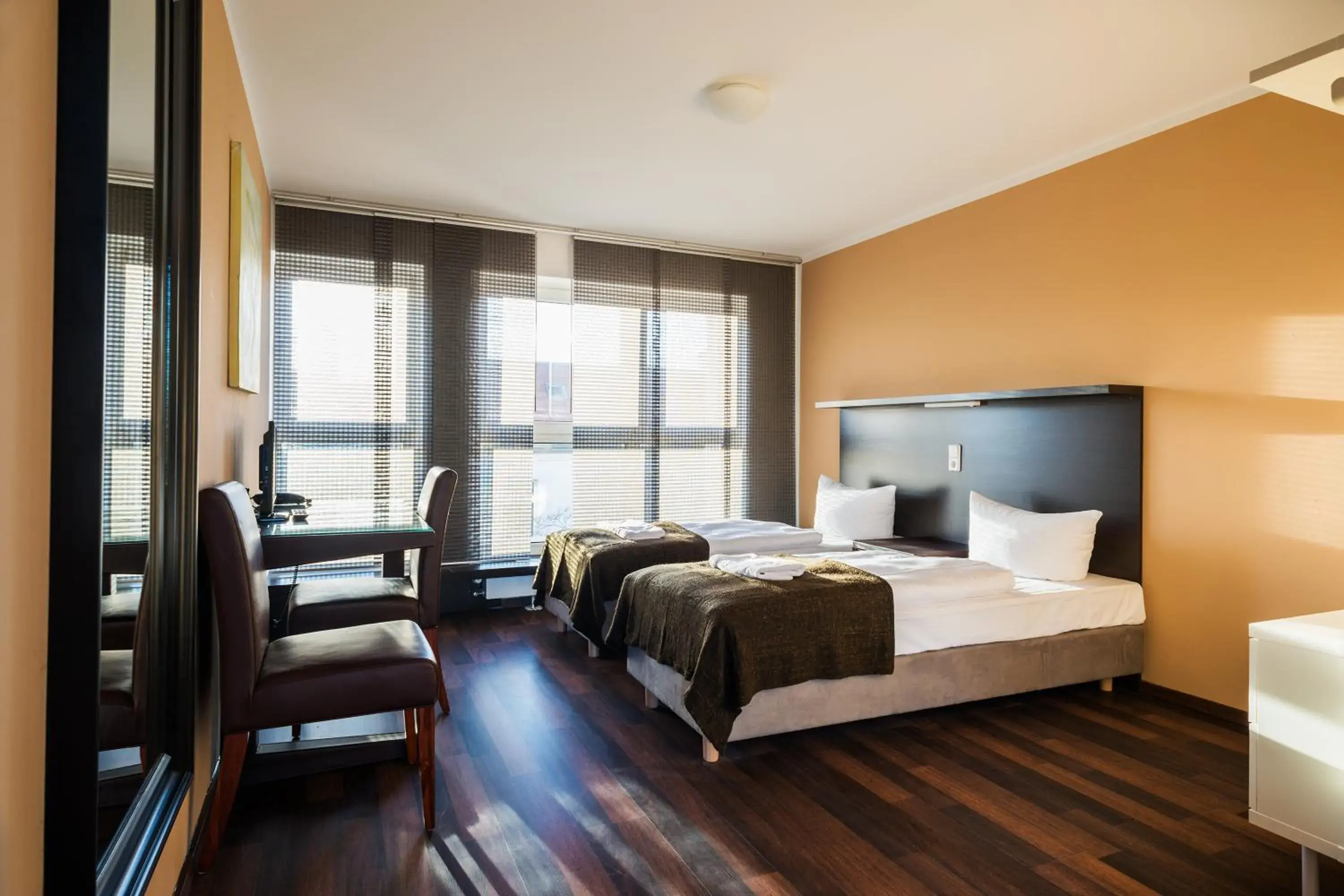 Photo of the whole room, Bed in Apple City Hotel Photo of the whole room, Bed in Apple City Hotel