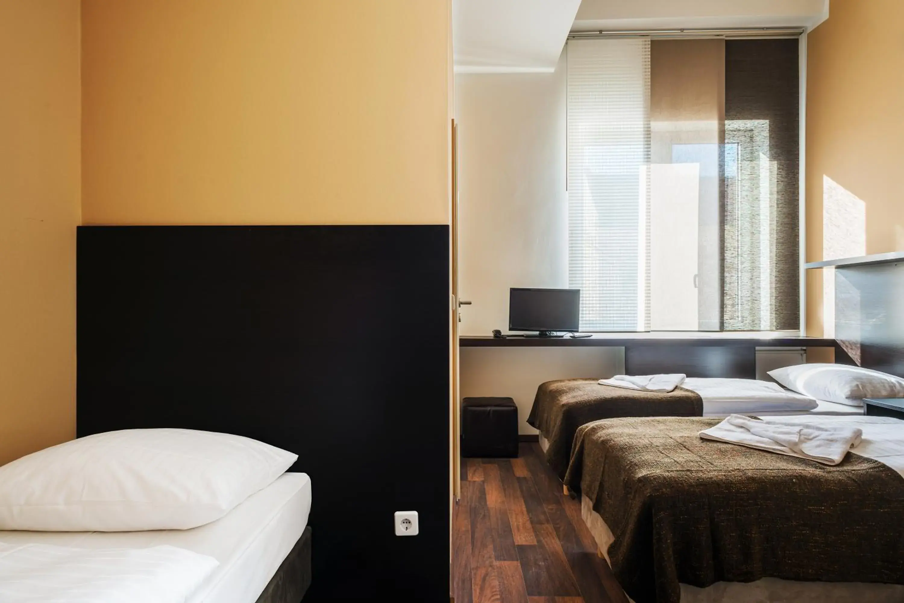 Photo of the whole room, Bed in Apple City Hotel Photo of the whole room, Bed in Apple City Hotel