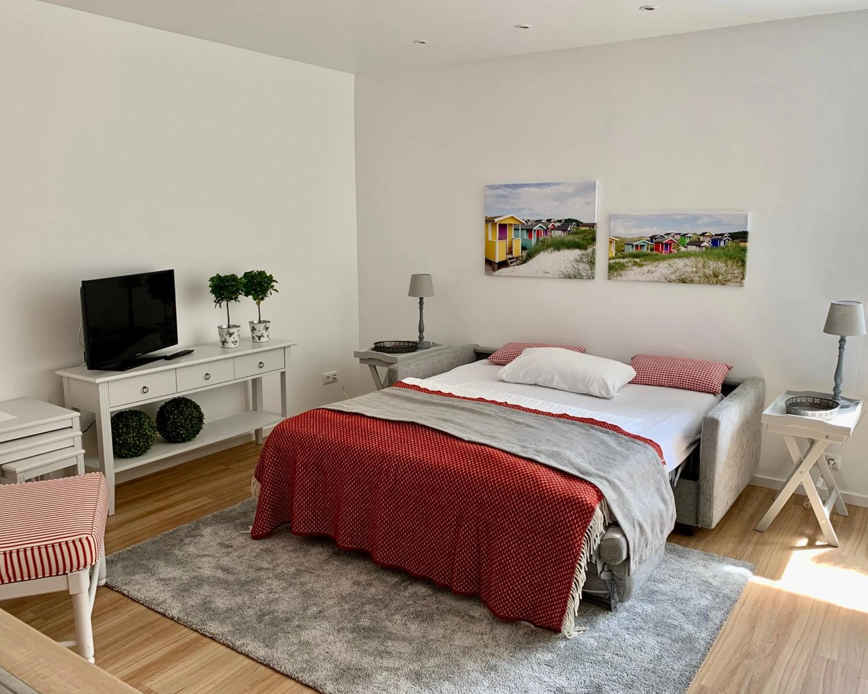 Bed in Luxx City Apartments