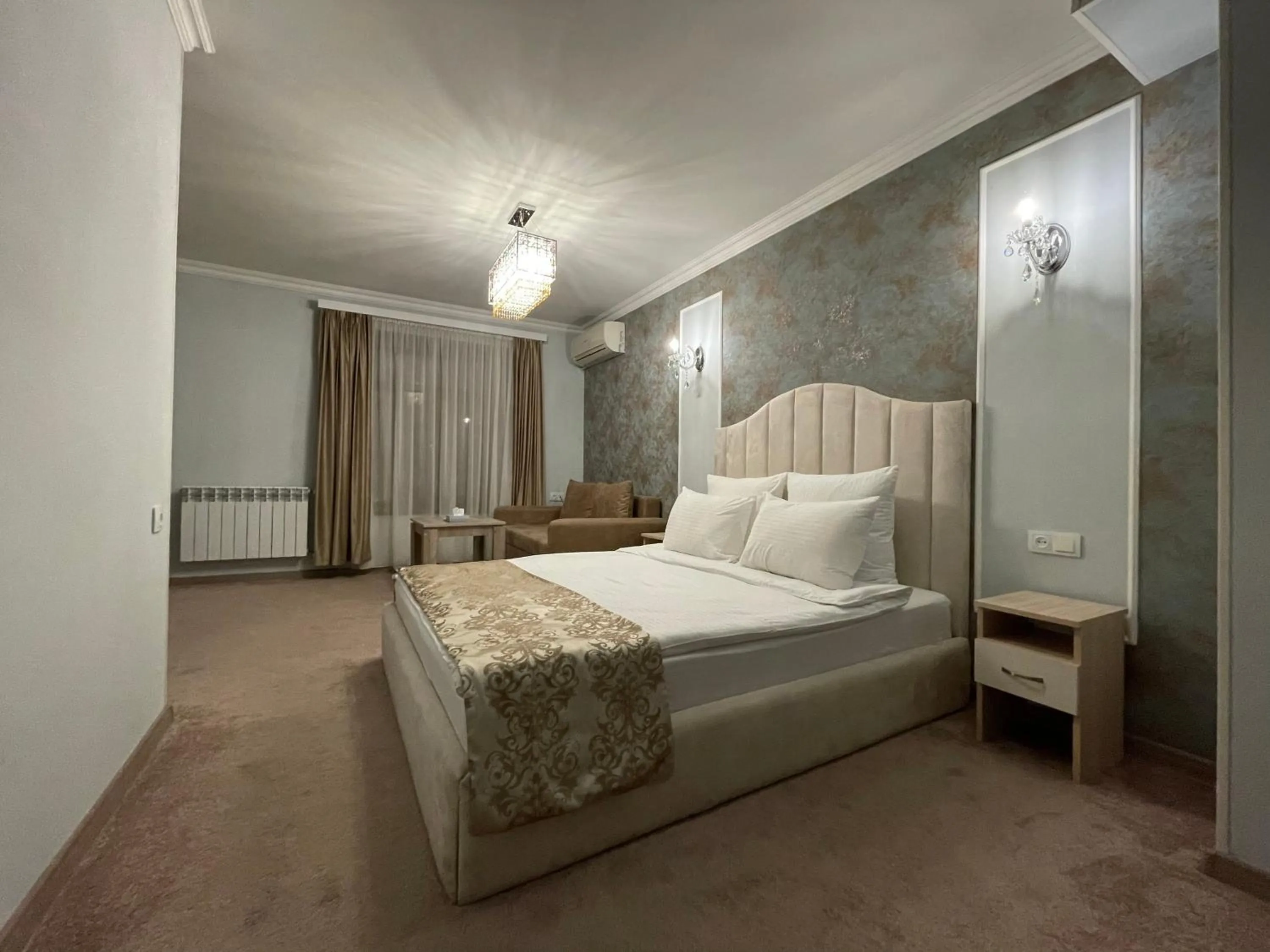 Bed in DeLin Hotel And Tours