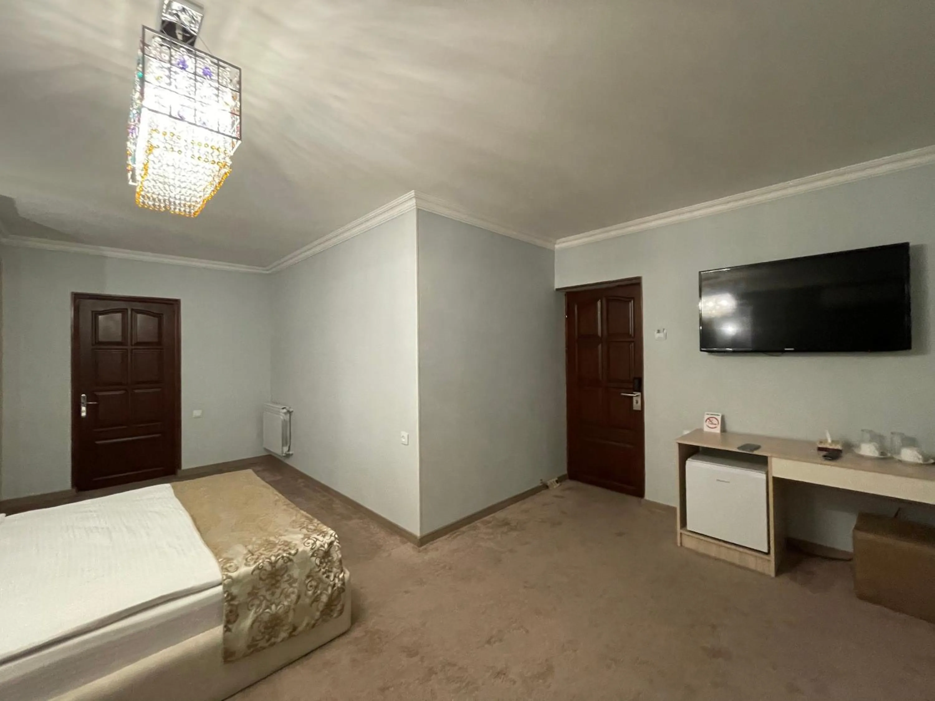 Bed in DeLin Hotel And Tours