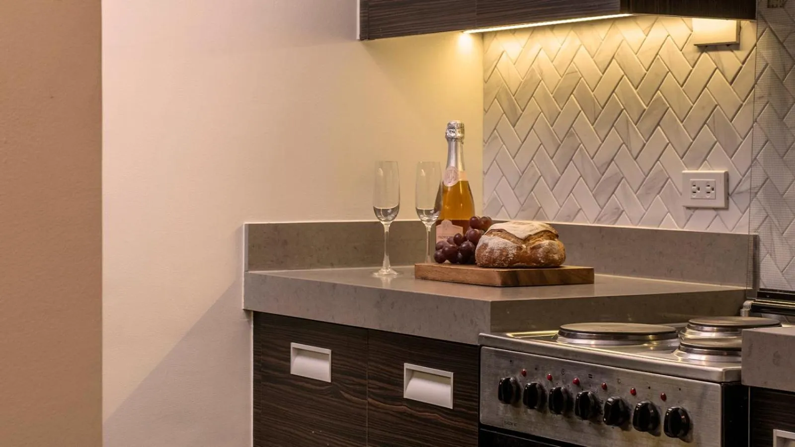 Kitchen or kitchenette in Aruga Apartments by Rockwell Makati