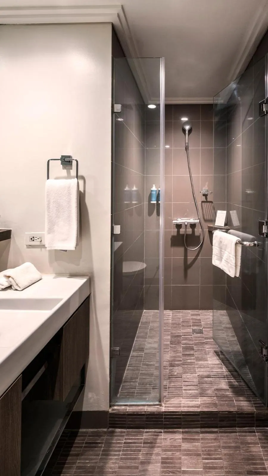 Shower in Aruga Apartments by Rockwell Makati