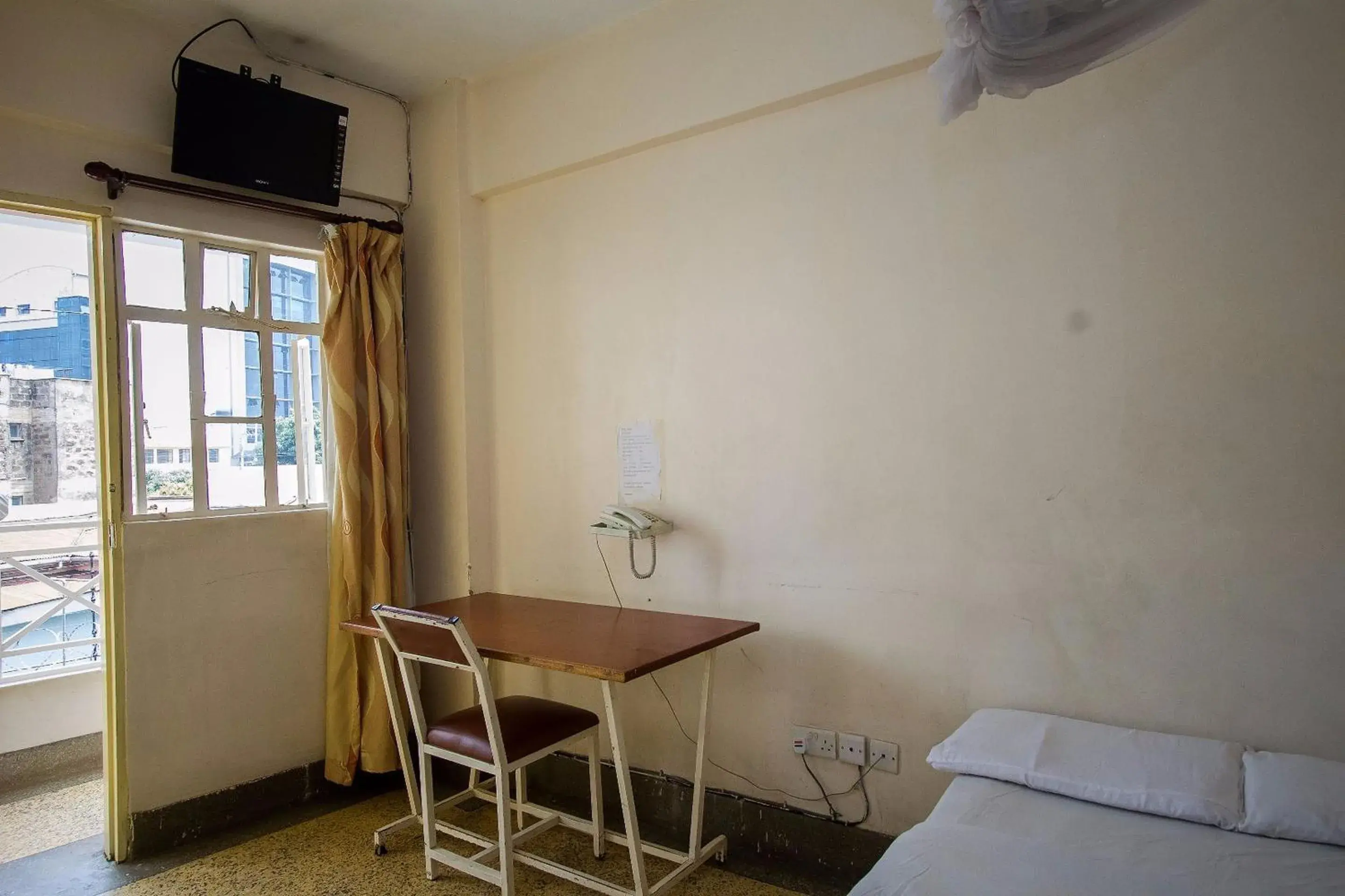 Seating area, Bed in Rabi Hotel Seating area, Bed in Rabi Hotel