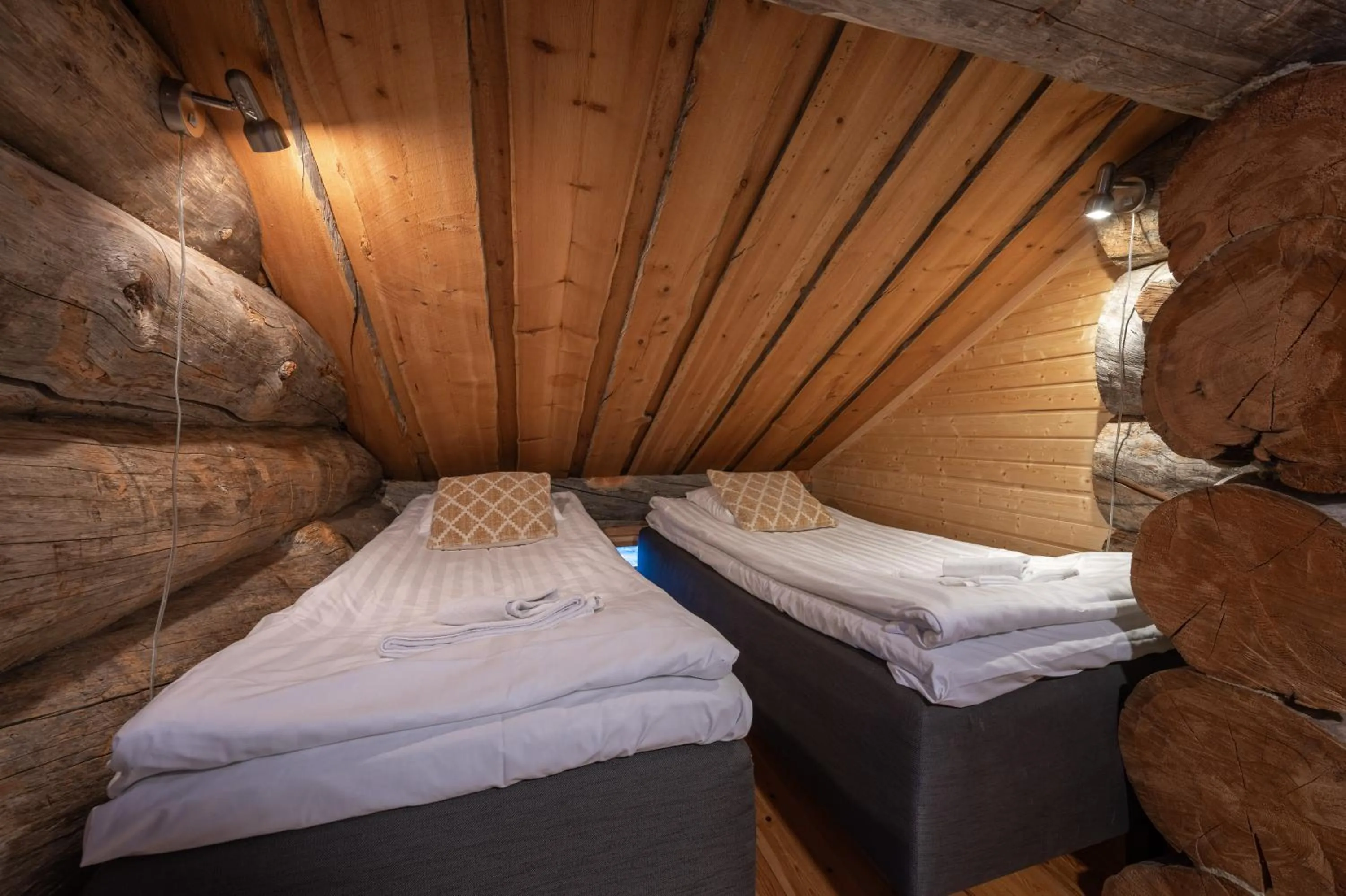 Bed in Kuukkeli Apartments Pikku-Hirvas ja Porotokka