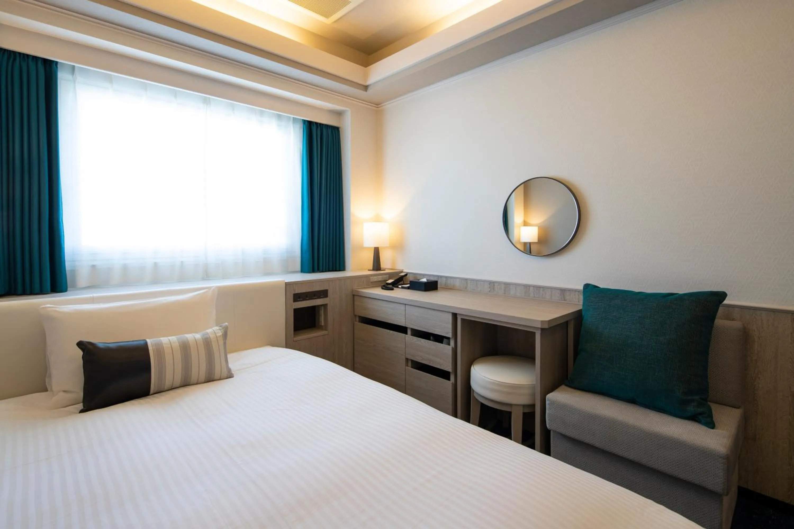 Bed in Shin Yokohama Grace Hotel