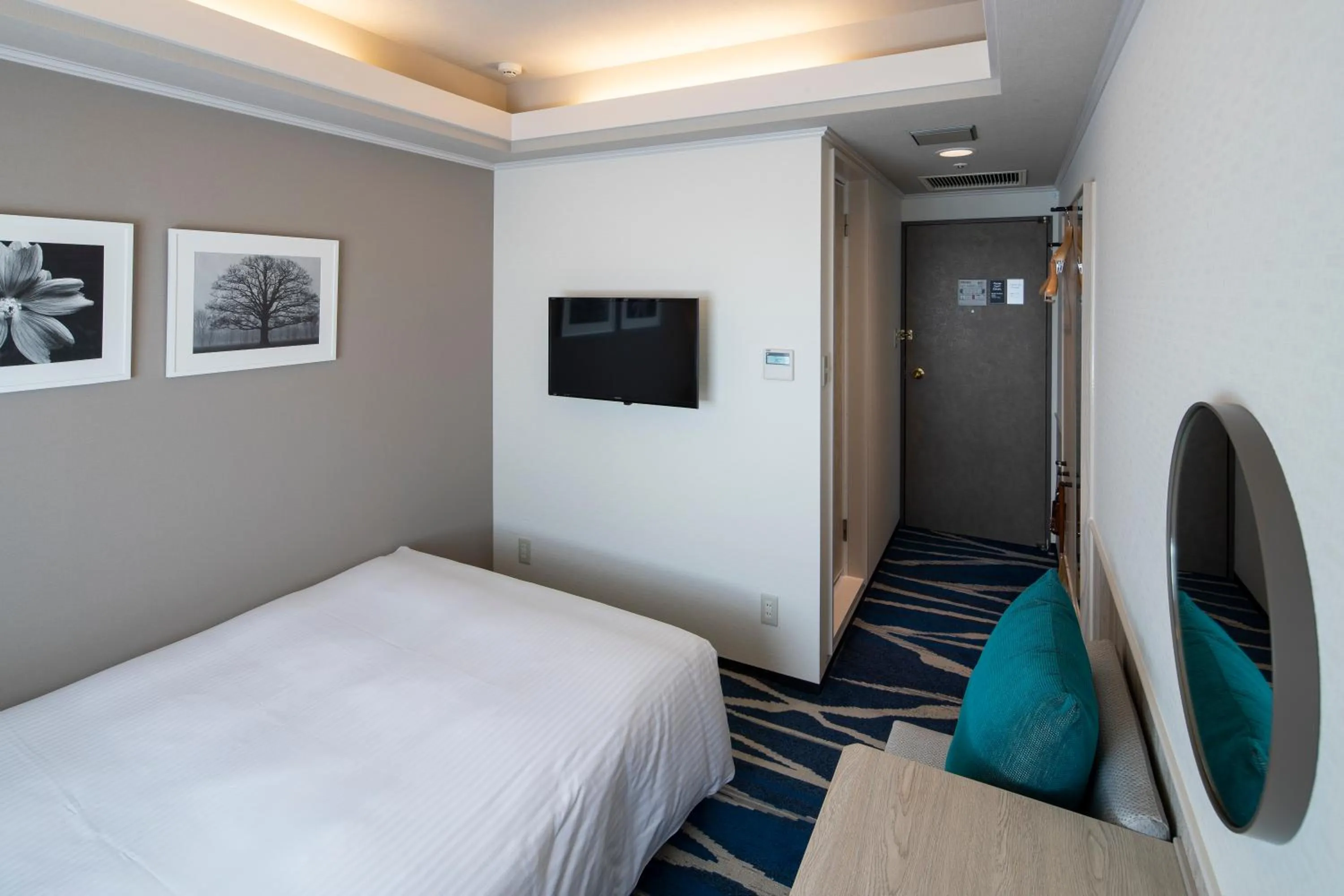 Bed in Shin Yokohama Grace Hotel