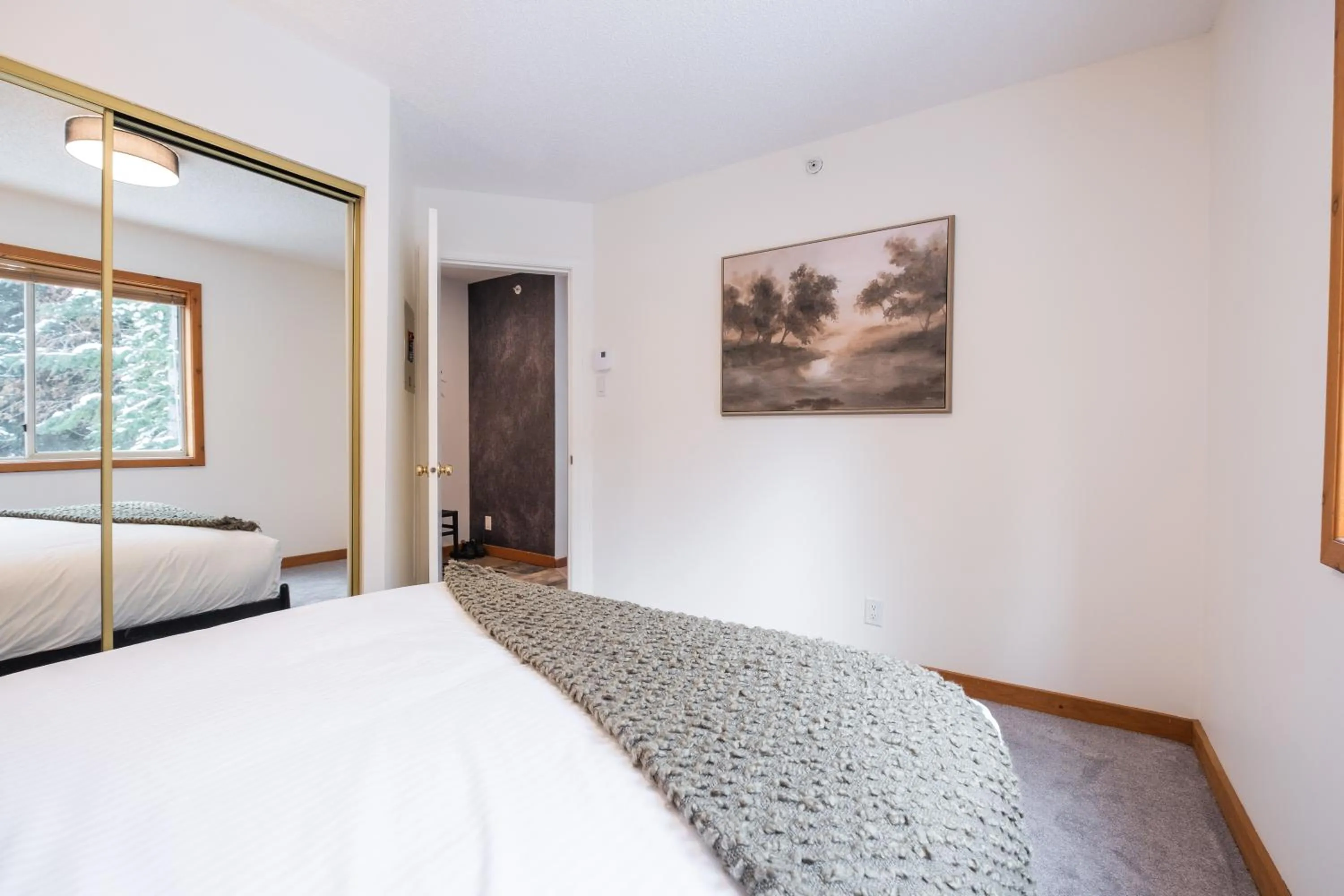 Bed in Powderview by Outpost Whistler
