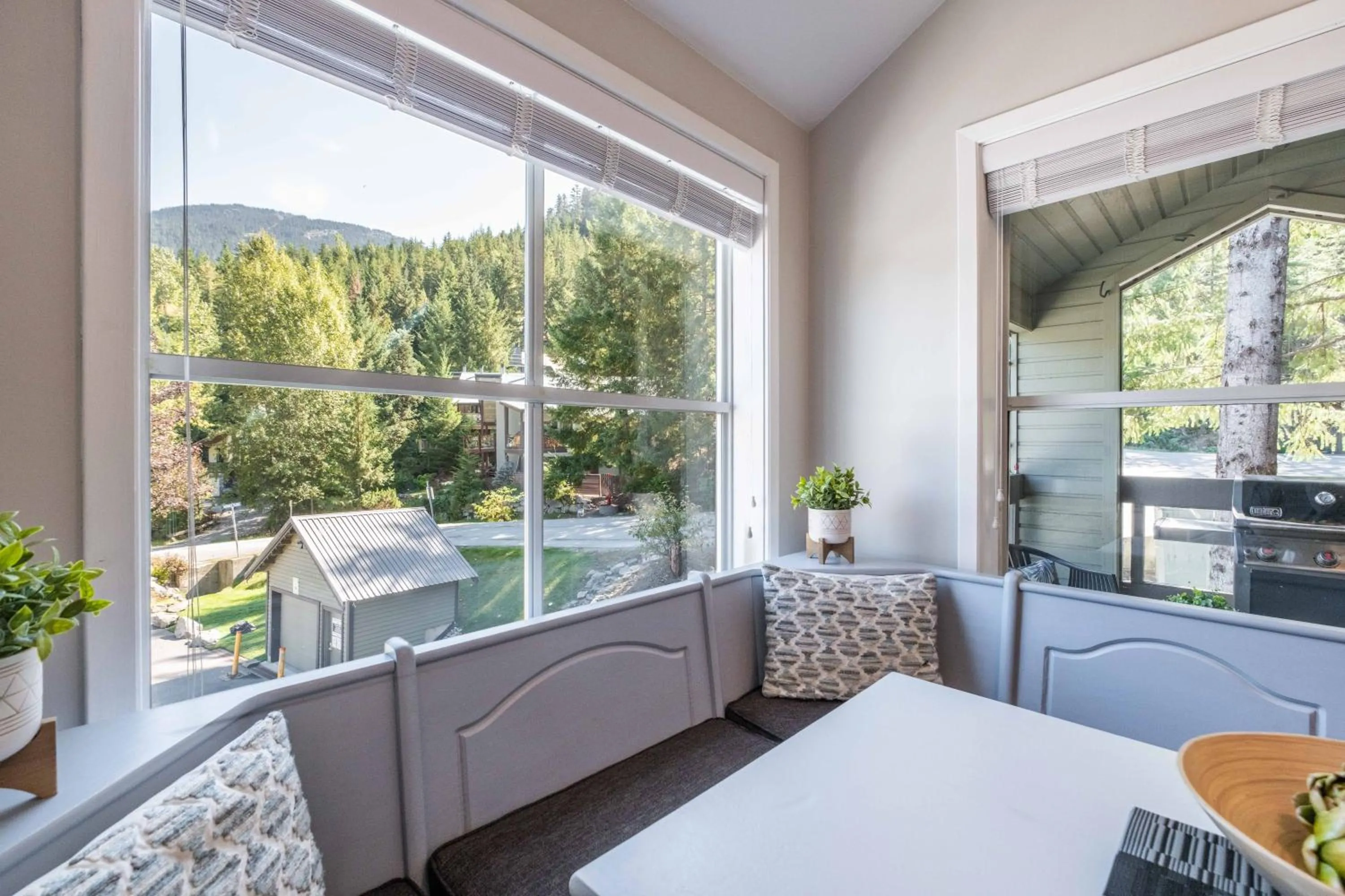 Dining area in Powderview by Outpost Whistler