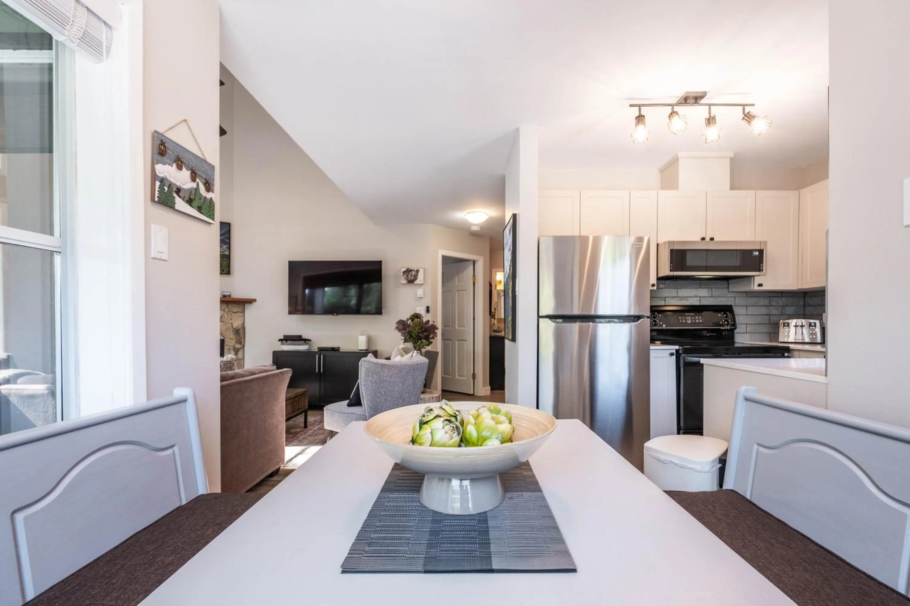 Dining area in Powderview by Outpost Whistler