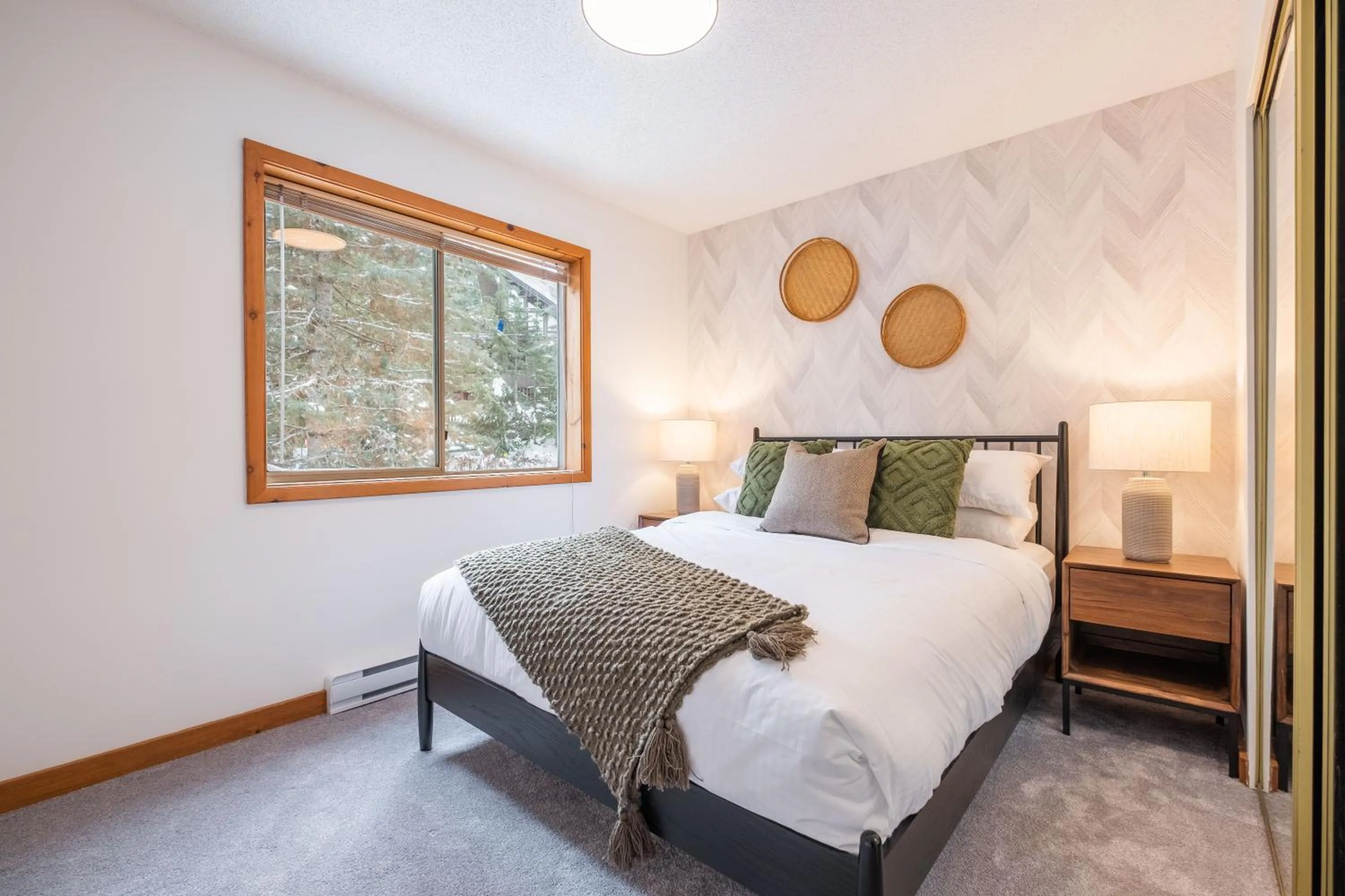 Bed in Powderview by Outpost Whistler