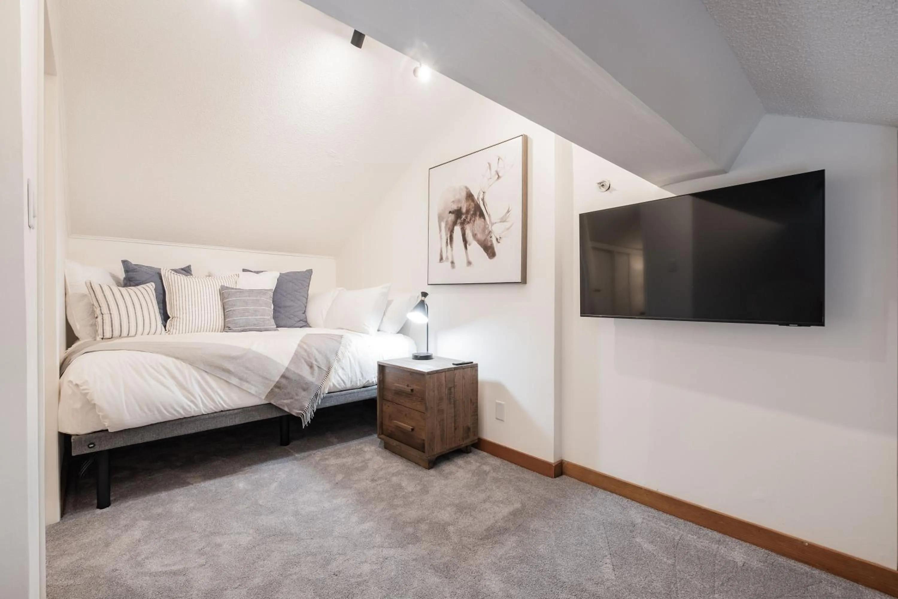 Bed in Powderview by Outpost Whistler