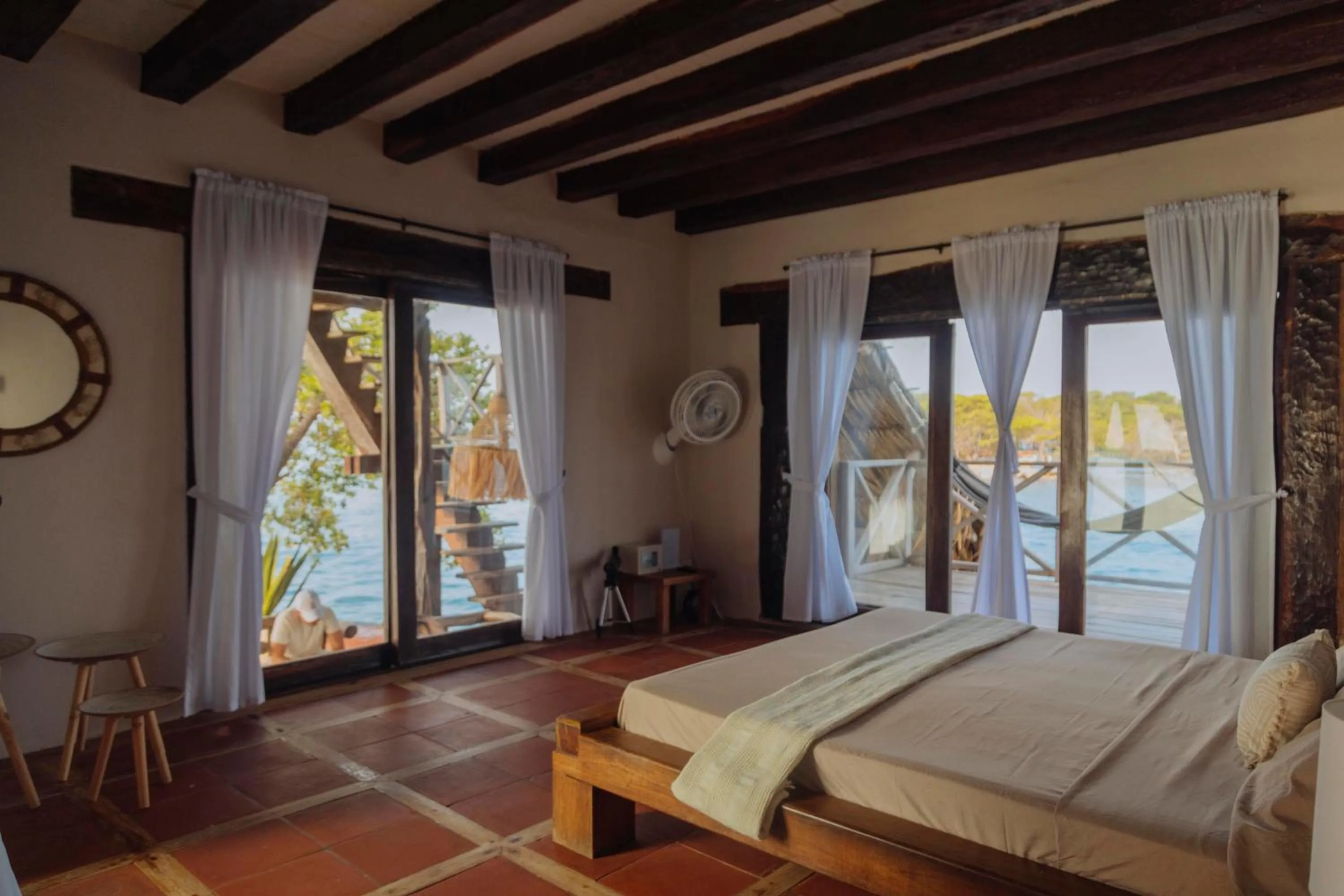 Bed in Isla Kalua - Private Ocean Villa