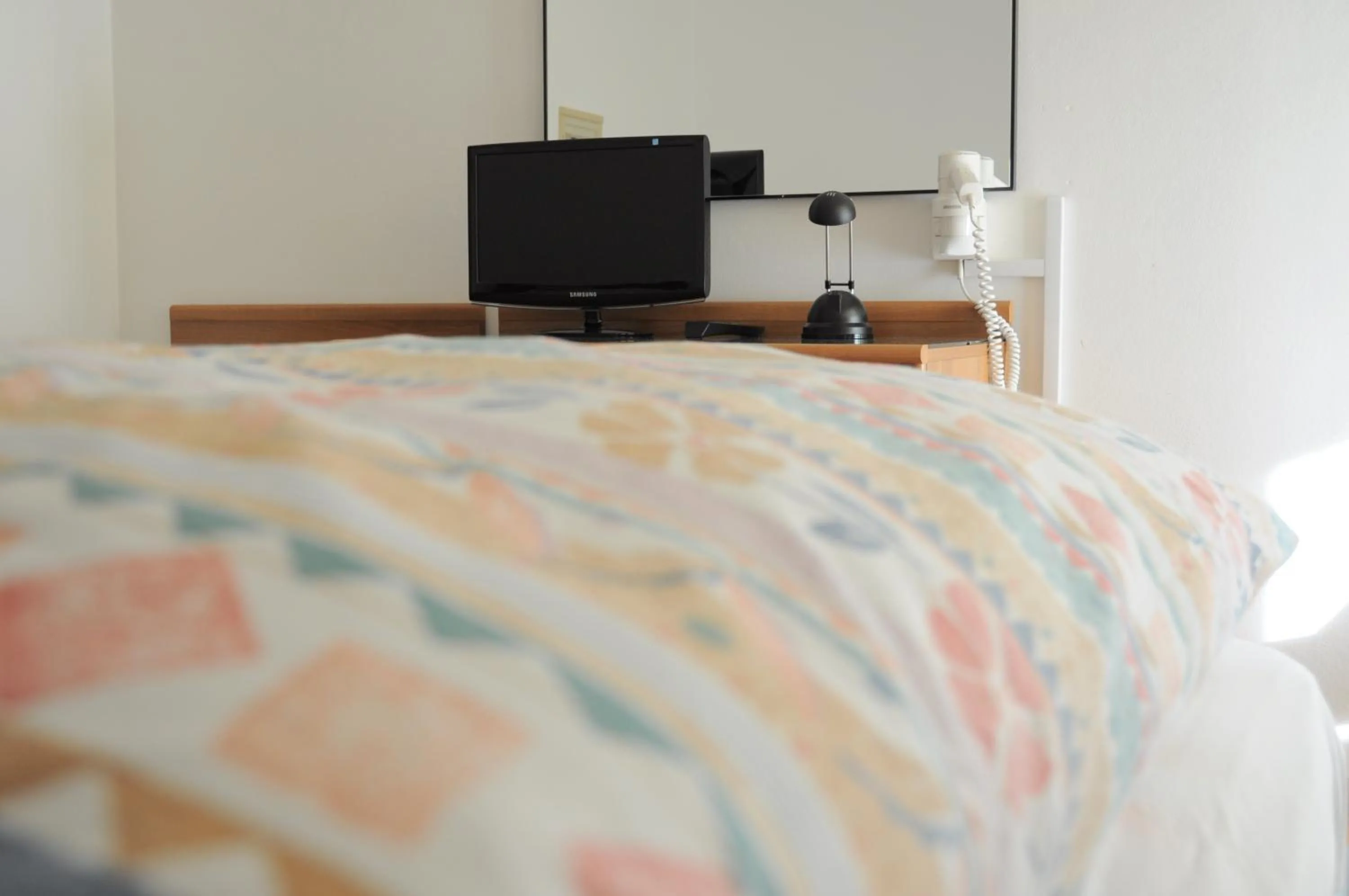 Bed in Hotel Europa Cembra