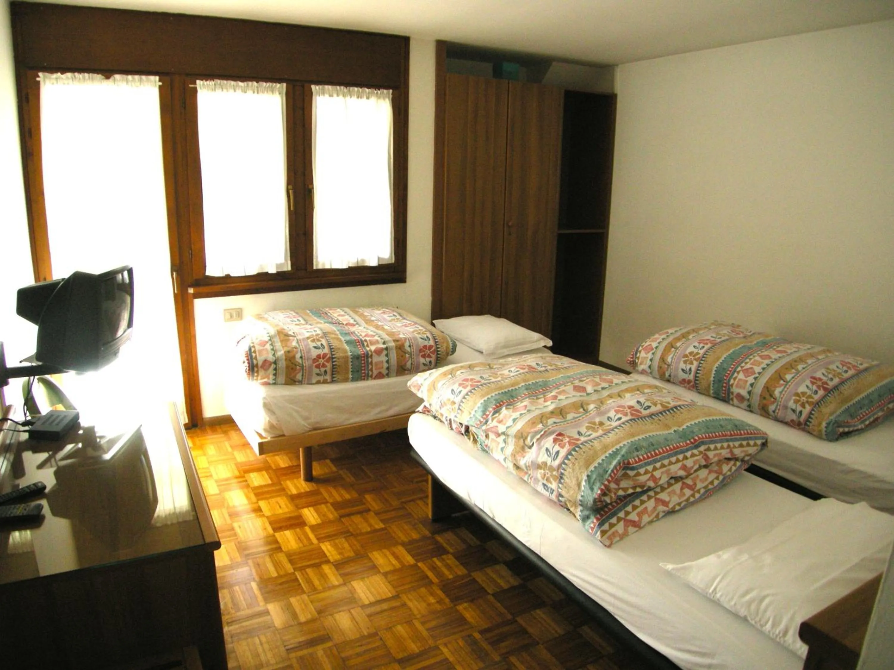 Bed in Hotel Europa Cembra