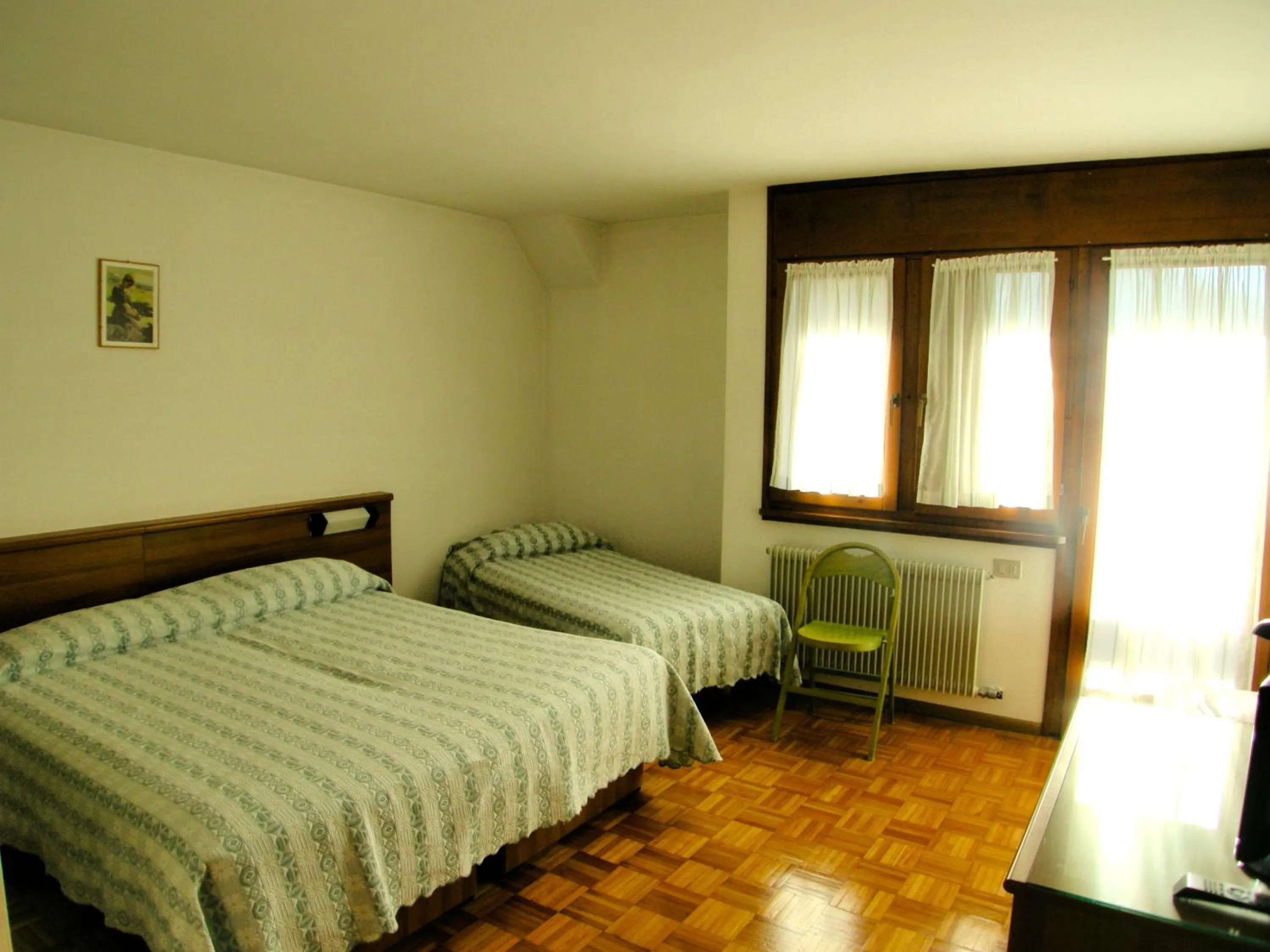 Bed in Hotel Europa Cembra