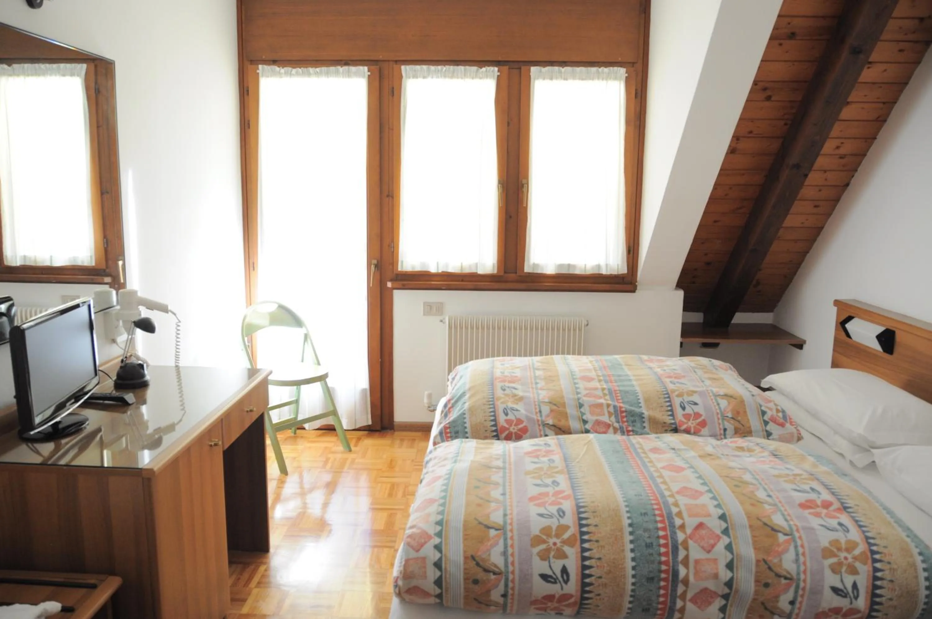 Bed in Hotel Europa Cembra