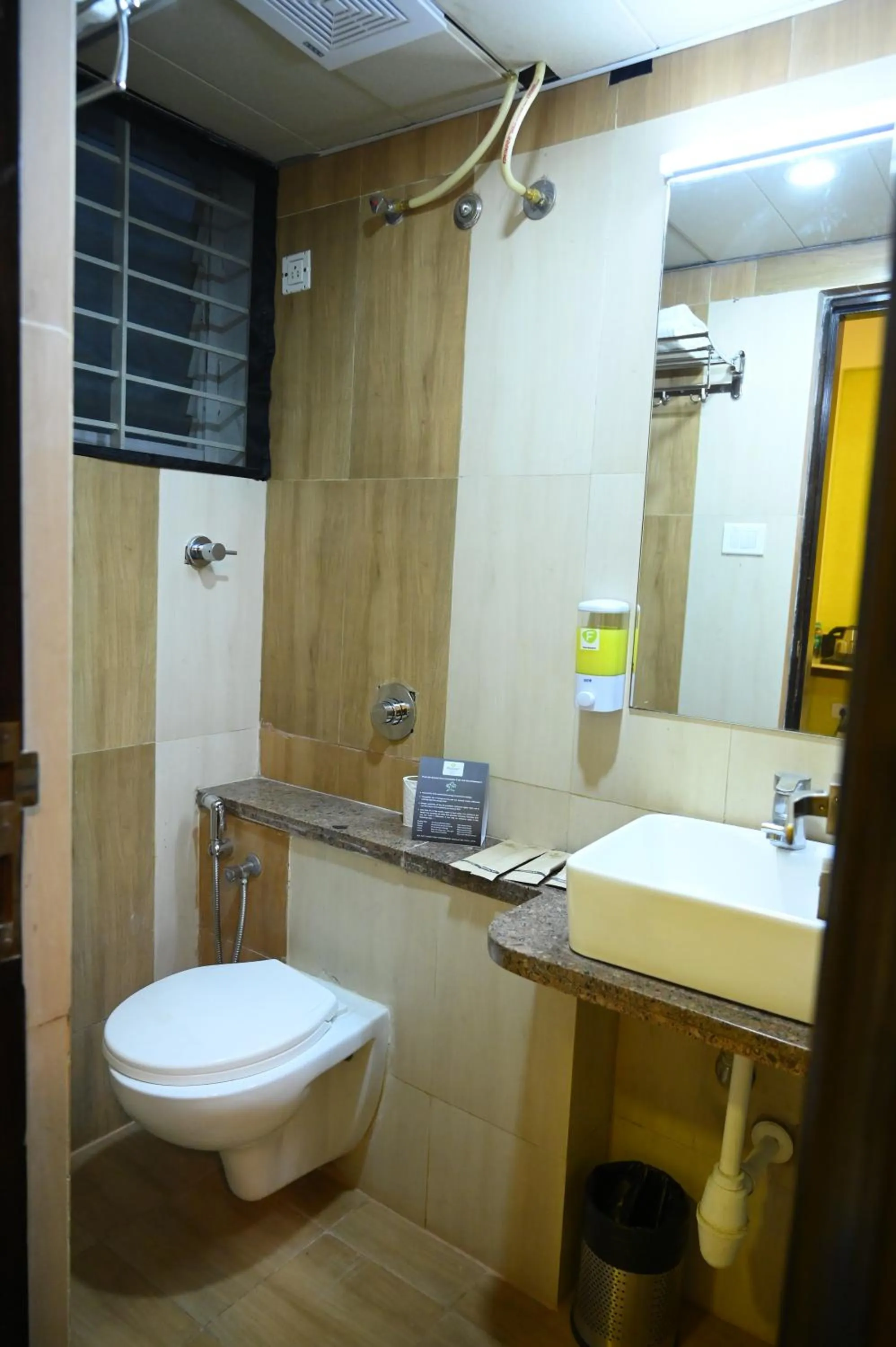 Bathroom in RAJKIYAM - A Business Hotel