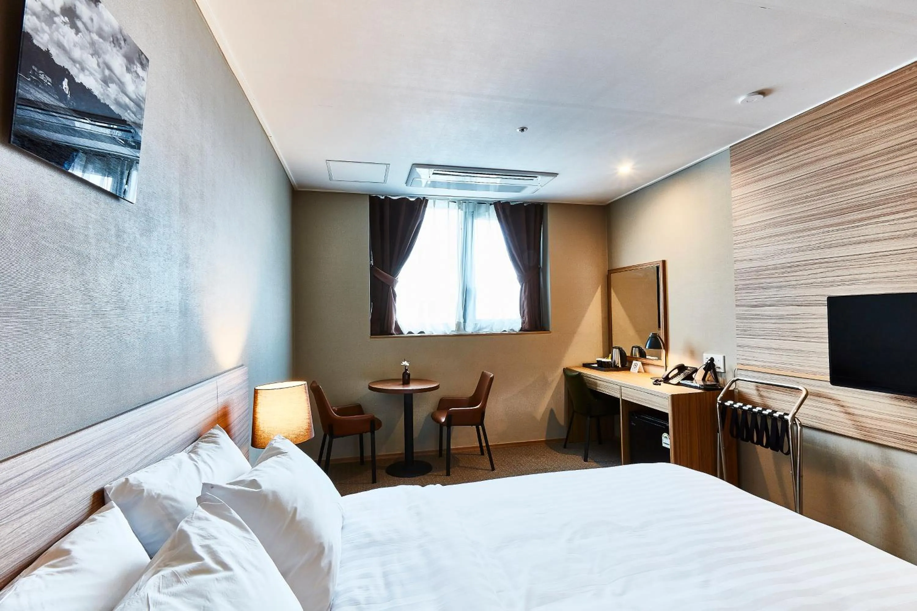 Bed in The Interra Hotel Pyeongtaek