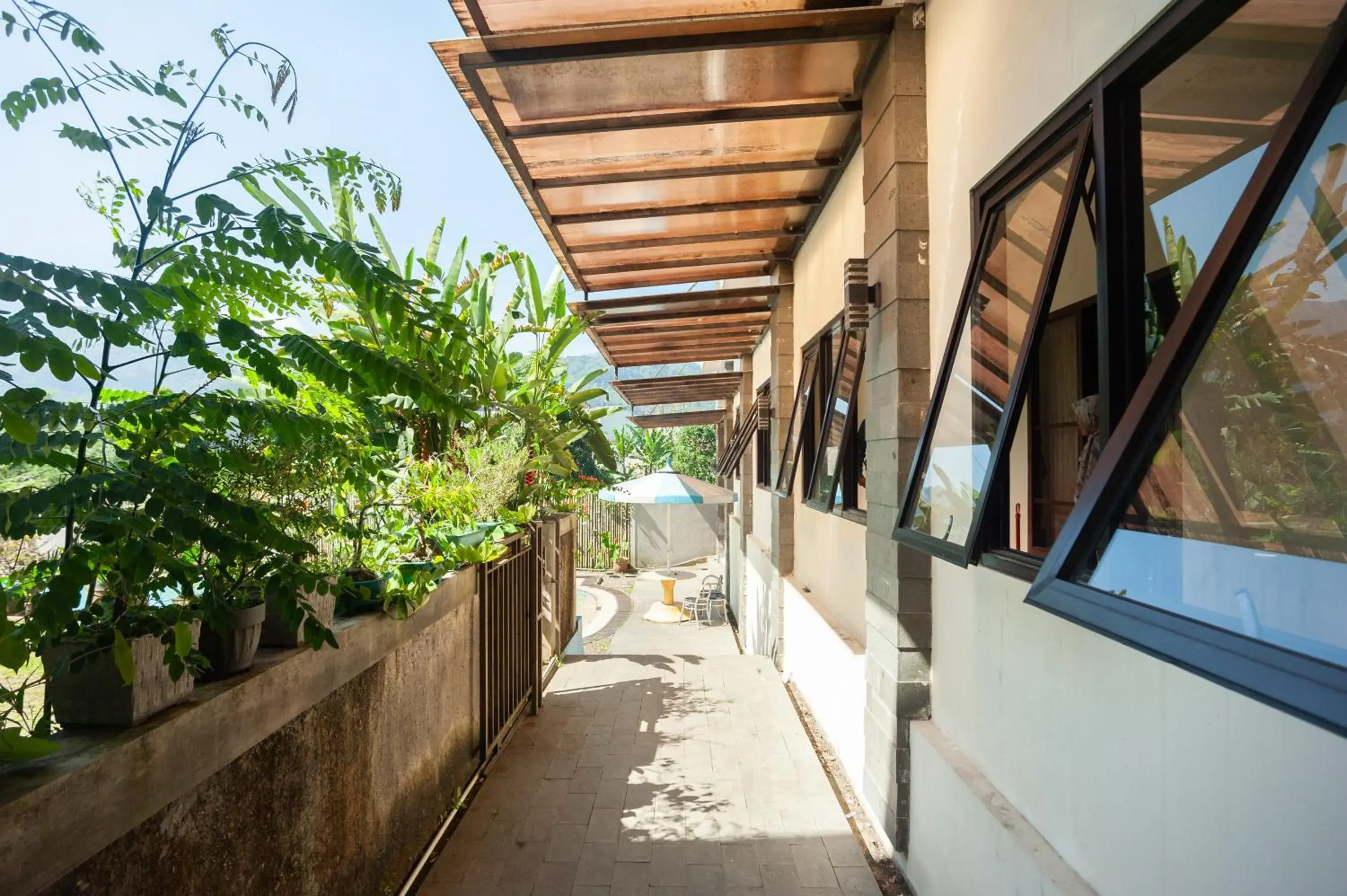 Property building in Urbanview Hotel Syariah Villa SM Cisarua Puncak by RedDoorz Property building in Urbanview Hotel Syariah Villa SM Cisarua Puncak by RedDoorz