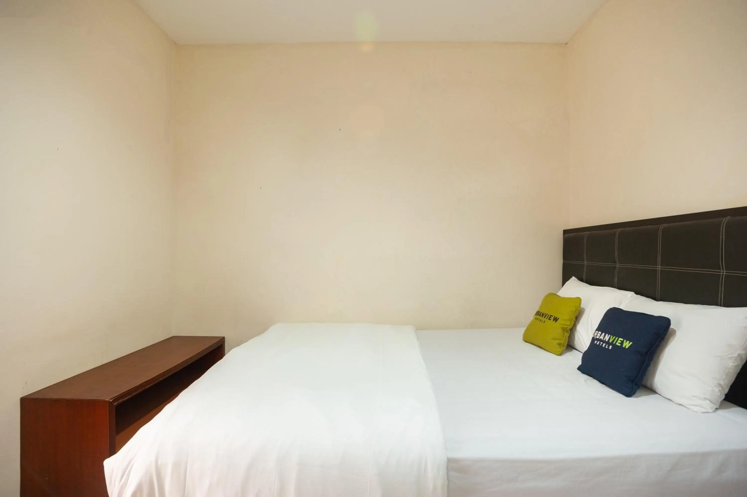 Bed in Urbanview Hotel Syariah Villa SM Cisarua Puncak by RedDoorz