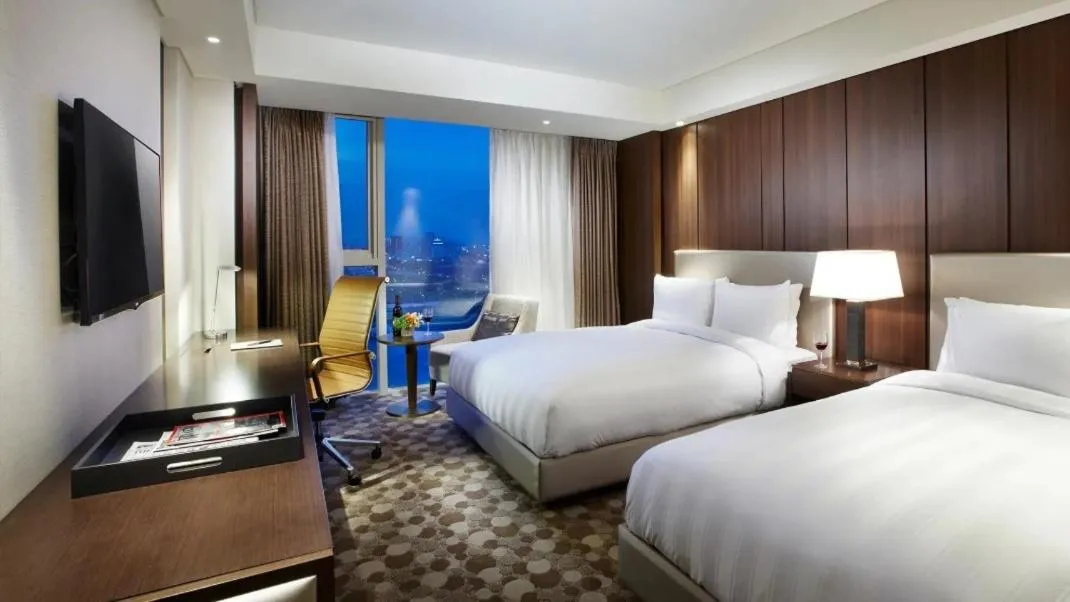 Bed in LOTTE CITY HOTEL Daejeon