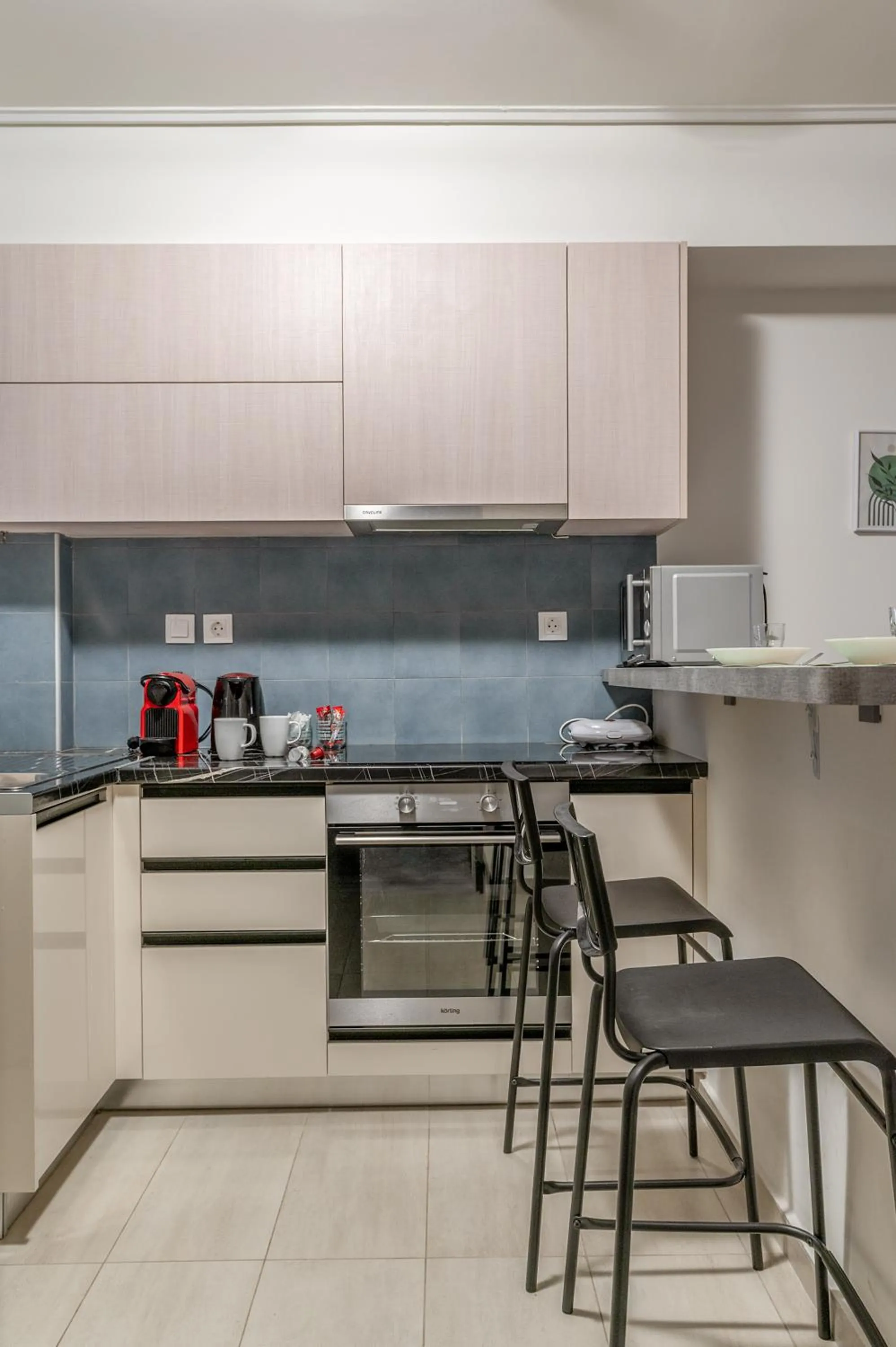 Kitchen or kitchenette in Elvita Apartments 4