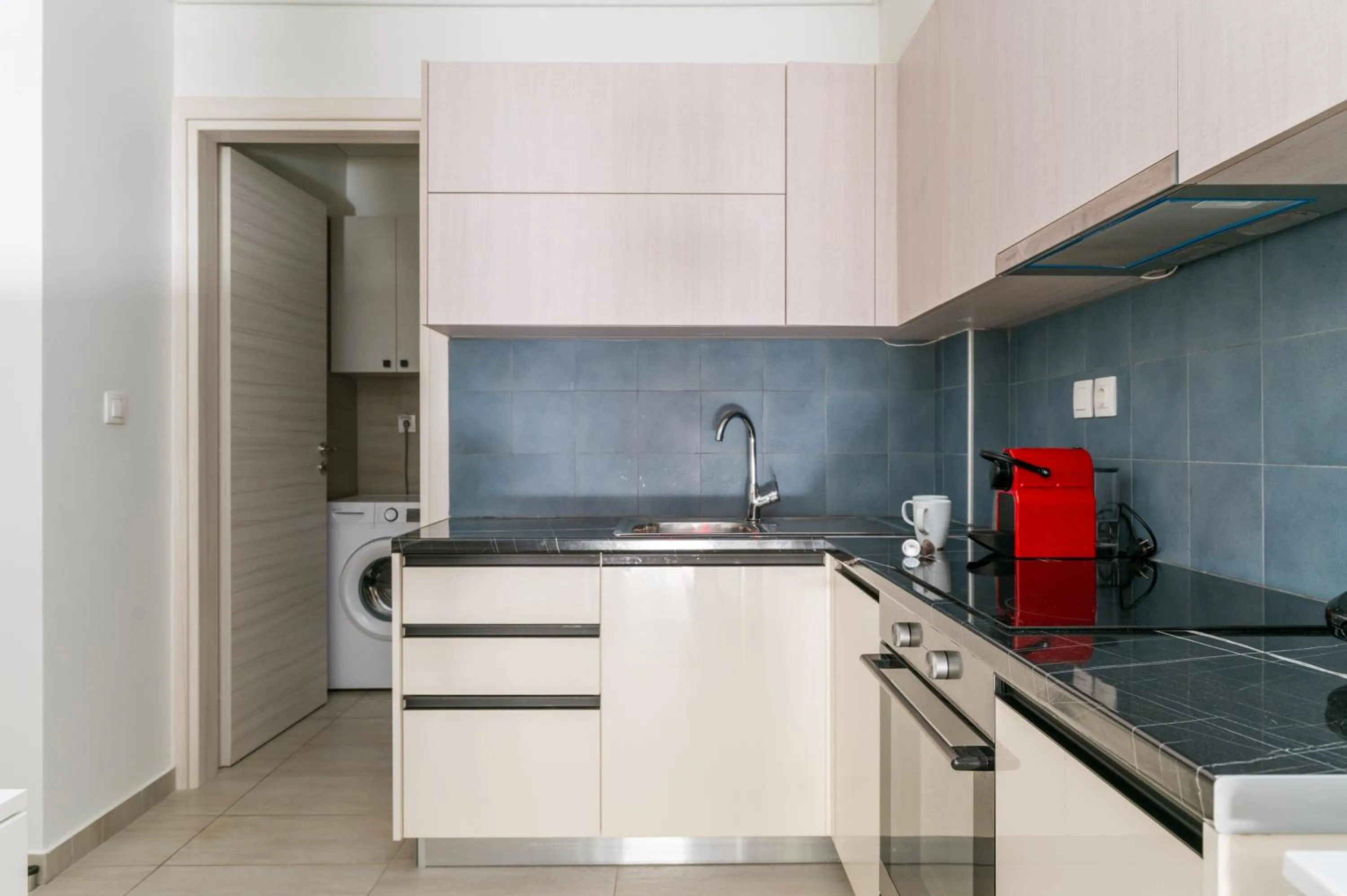 Kitchen or kitchenette in Elvita Apartments 4