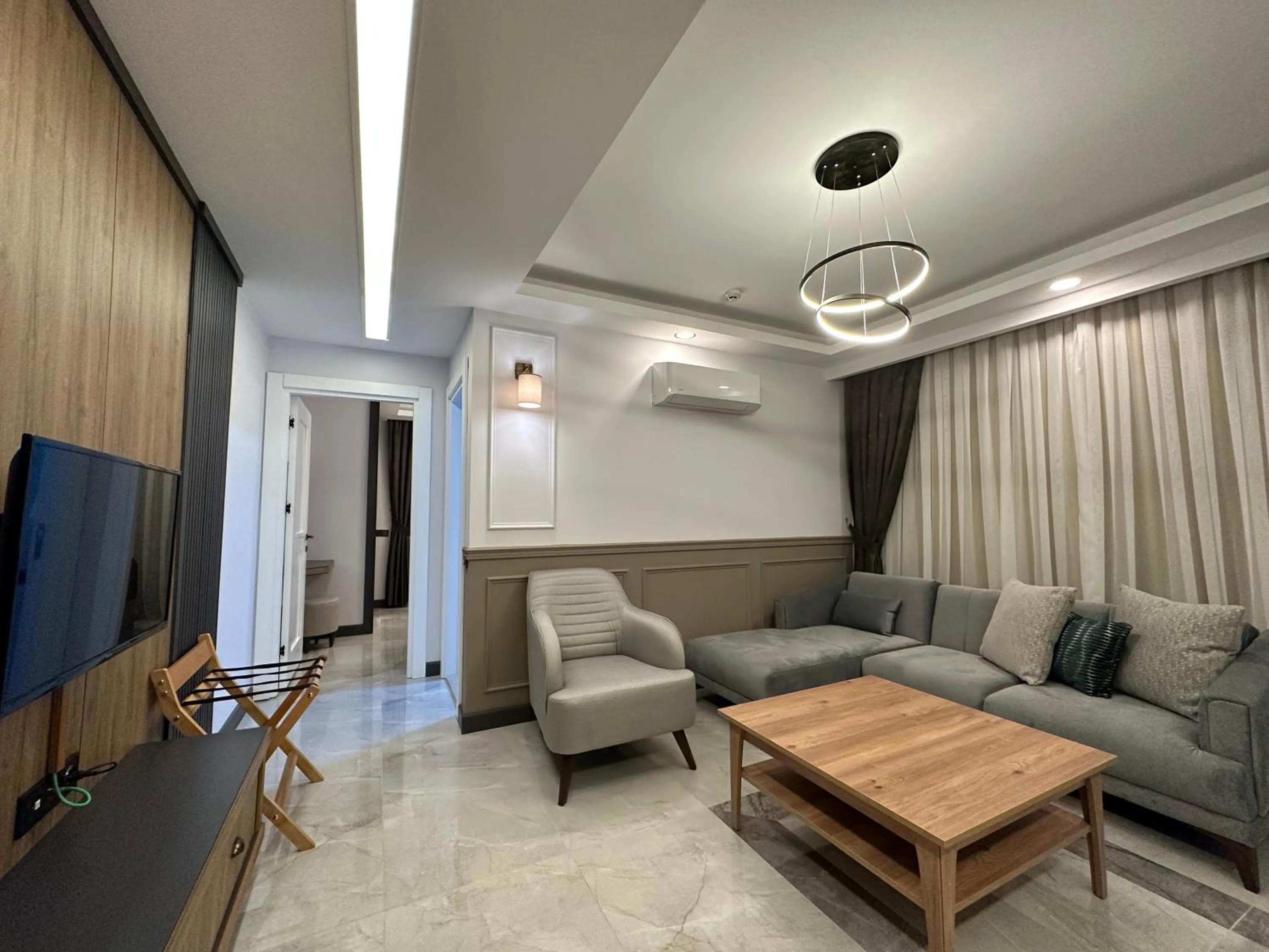 Living room in Quality Gold Suite Hotel