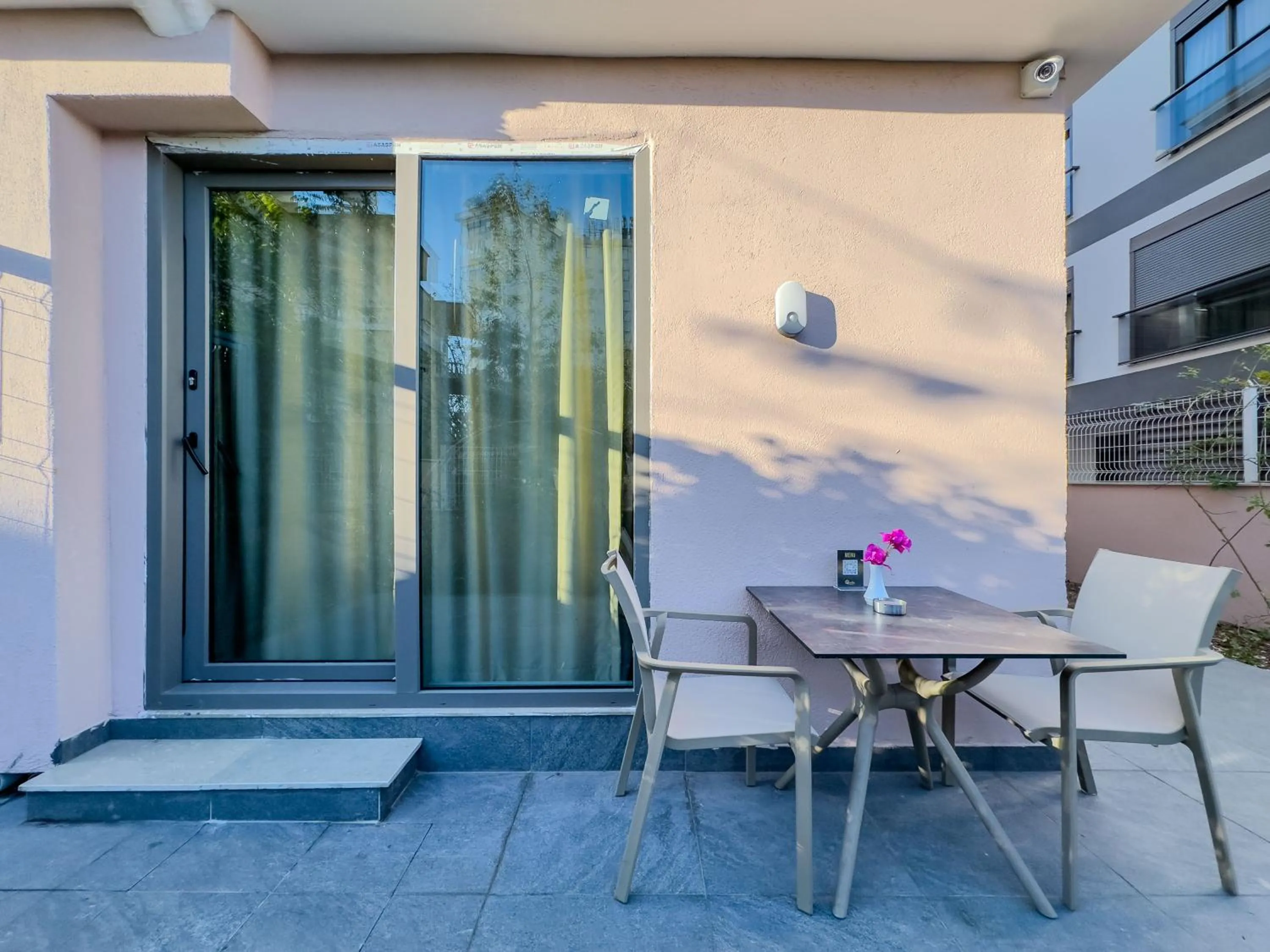 Patio in Quality Gold Suite Hotel