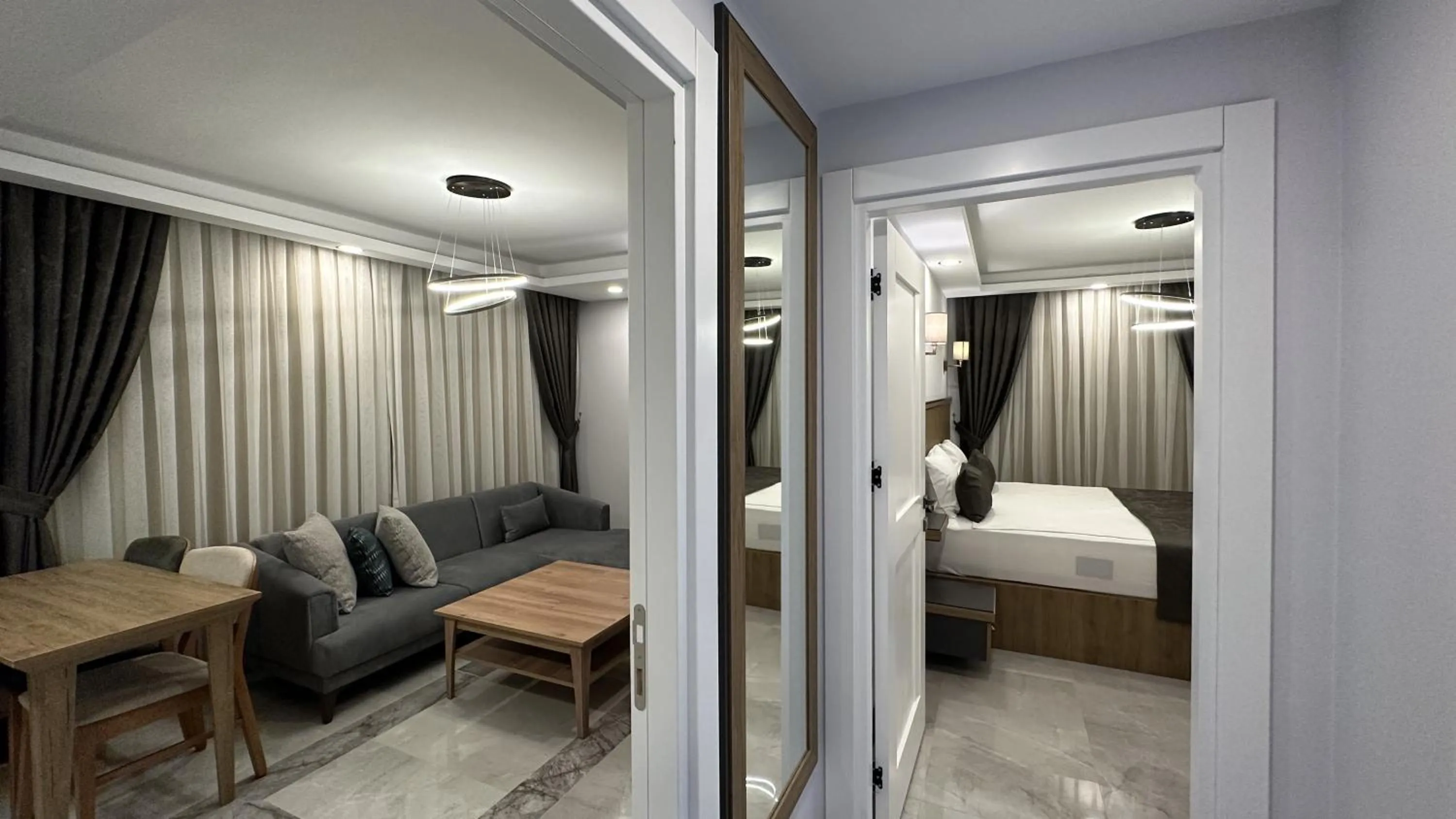 Bed in Quality Gold Suite Hotel