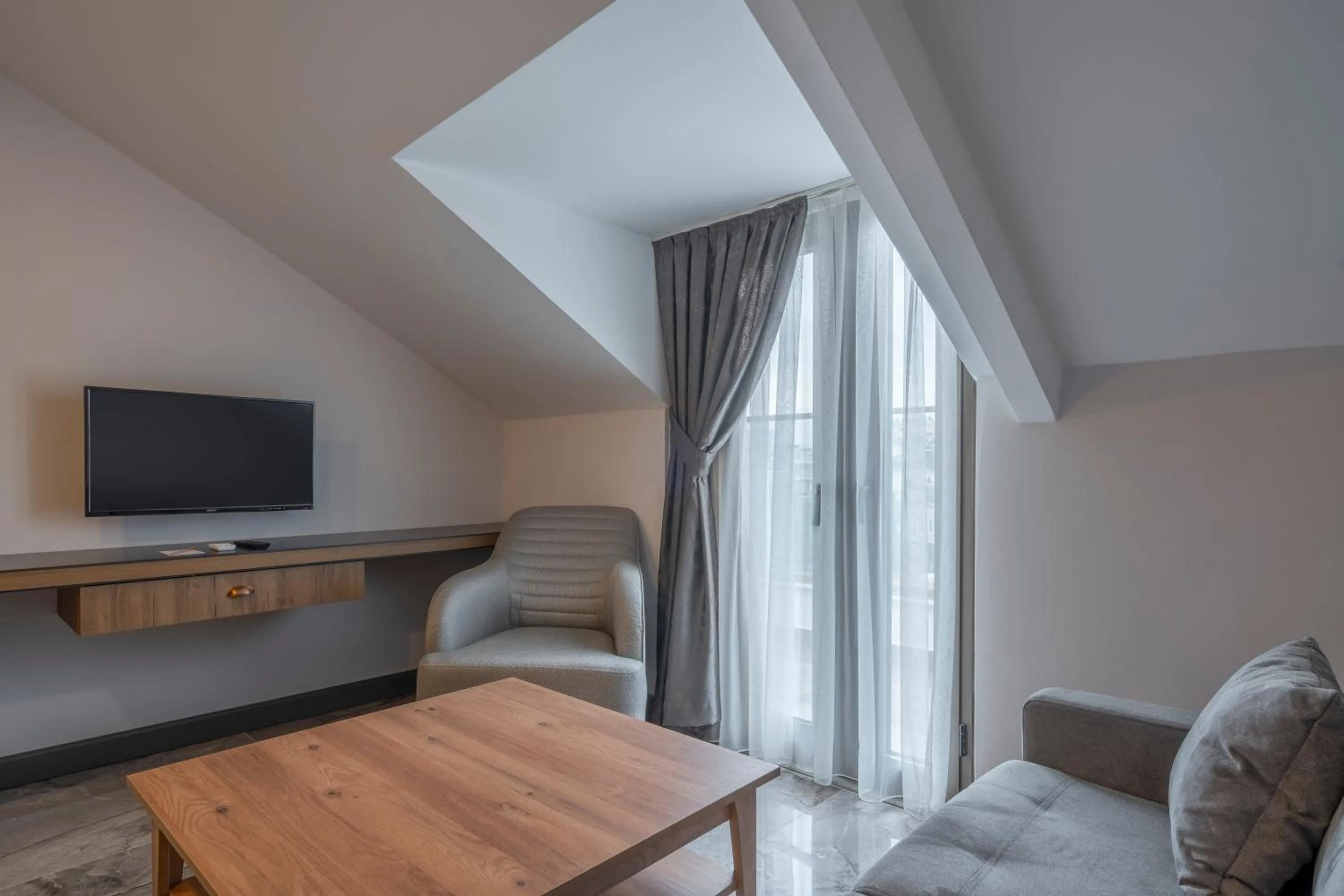 Bedroom in Quality Gold Suite Hotel