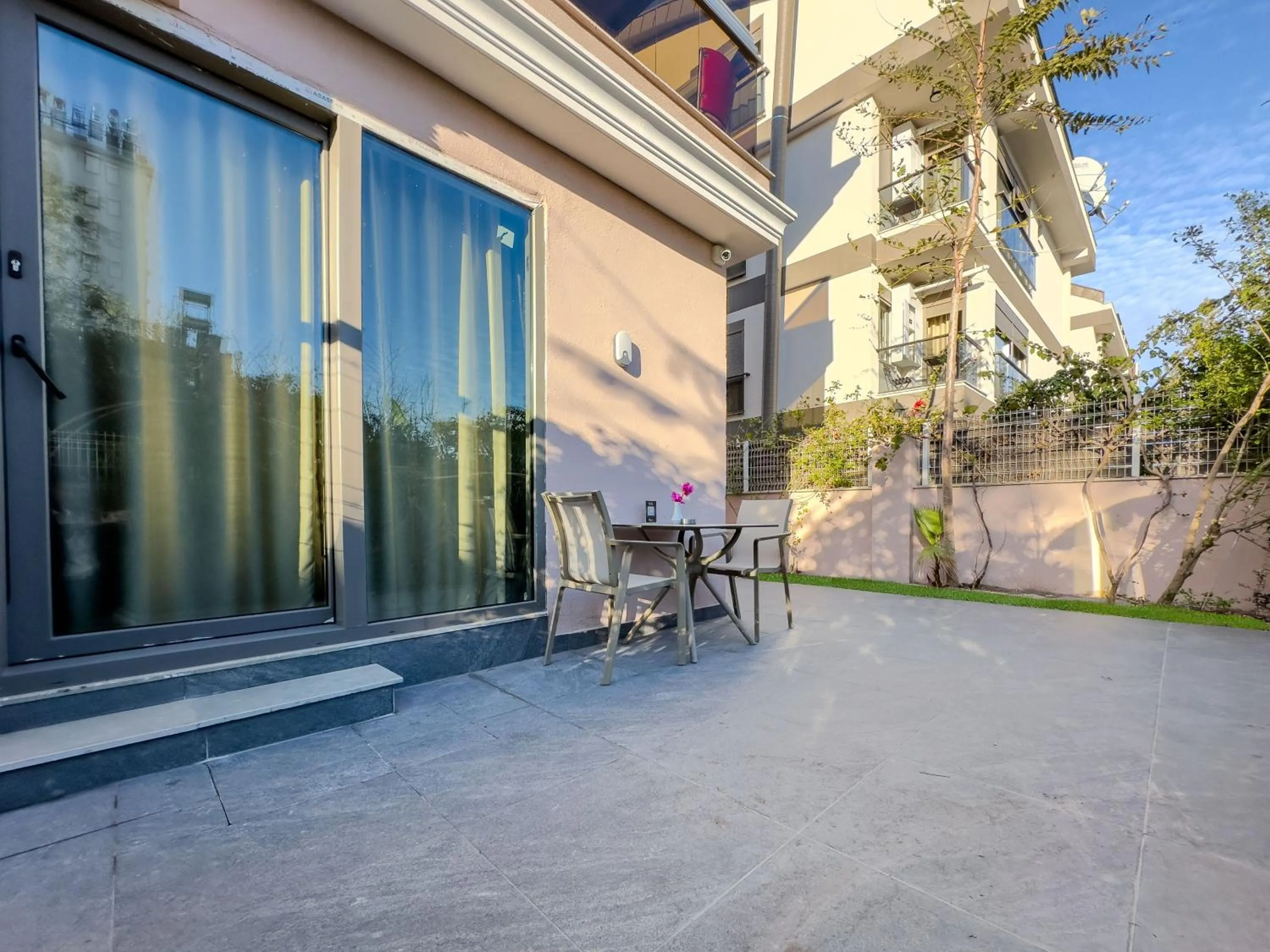 Patio in Quality Gold Suite Hotel