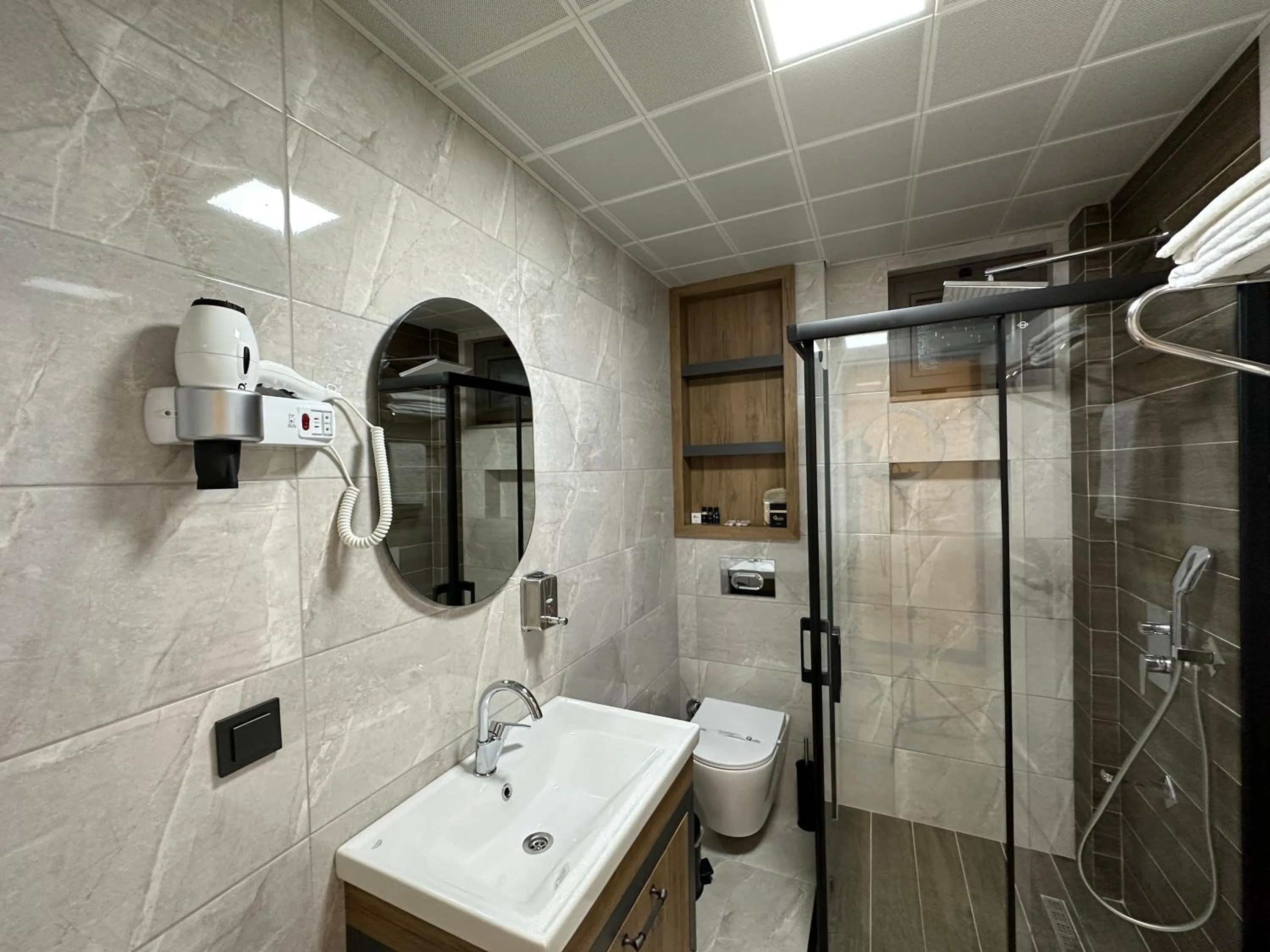 Bathroom in Quality Gold Suite Hotel