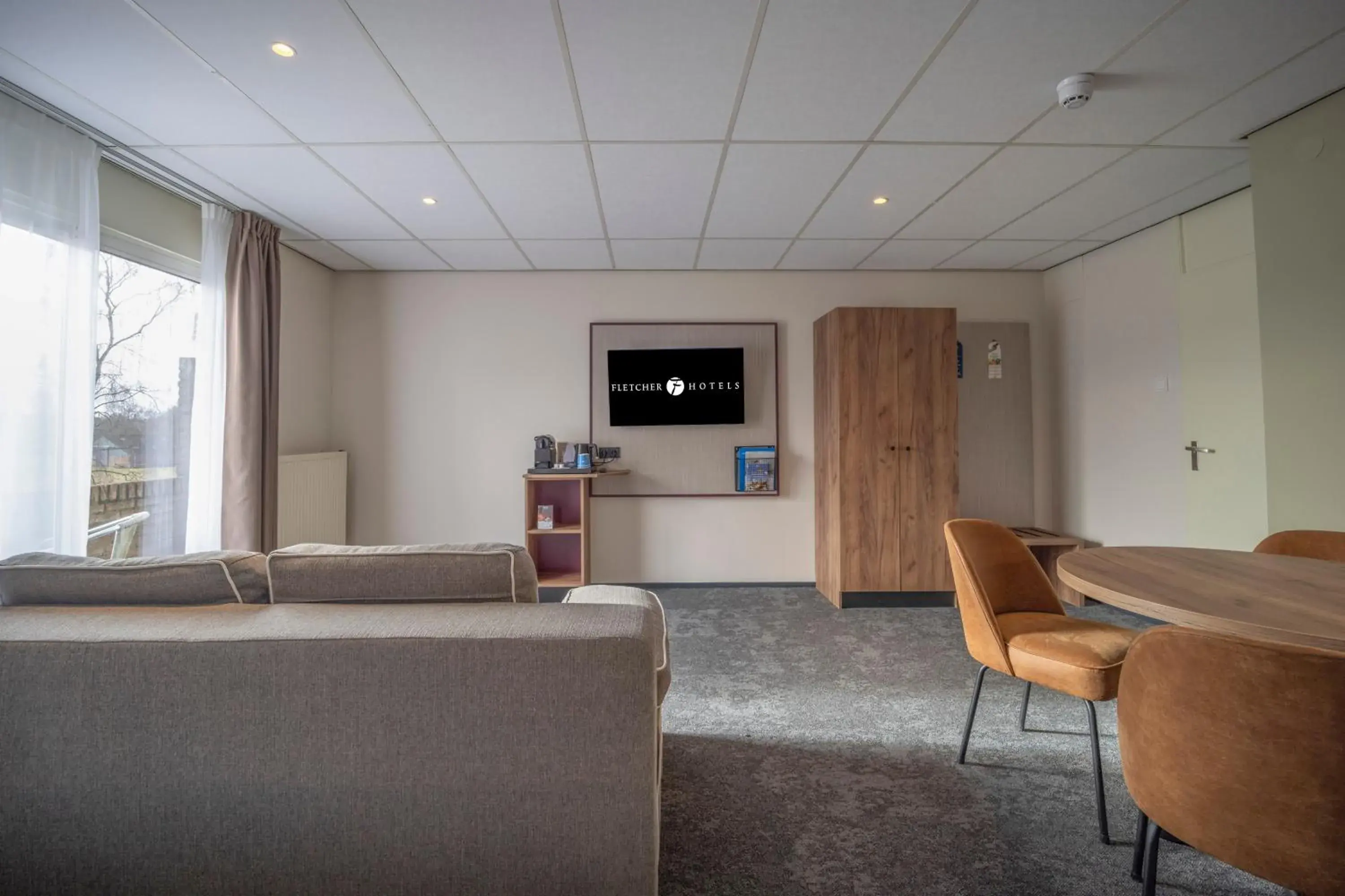 Living room in Fletcher Hotel - Restaurant de Zeegser Duinen Living room in Fletcher Hotel - Restaurant de Zeegser Duinen