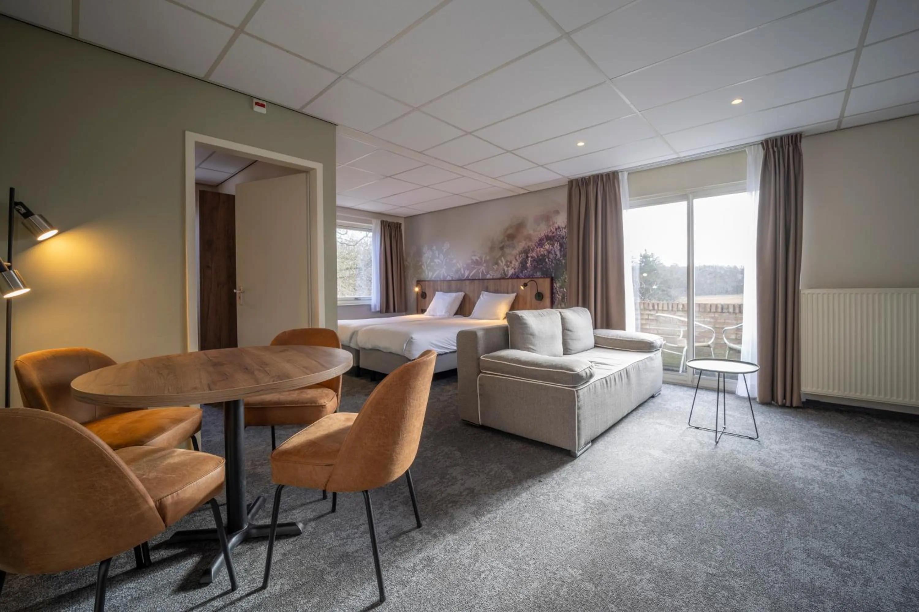 Seating area in Fletcher Hotel - Restaurant de Zeegser Duinen