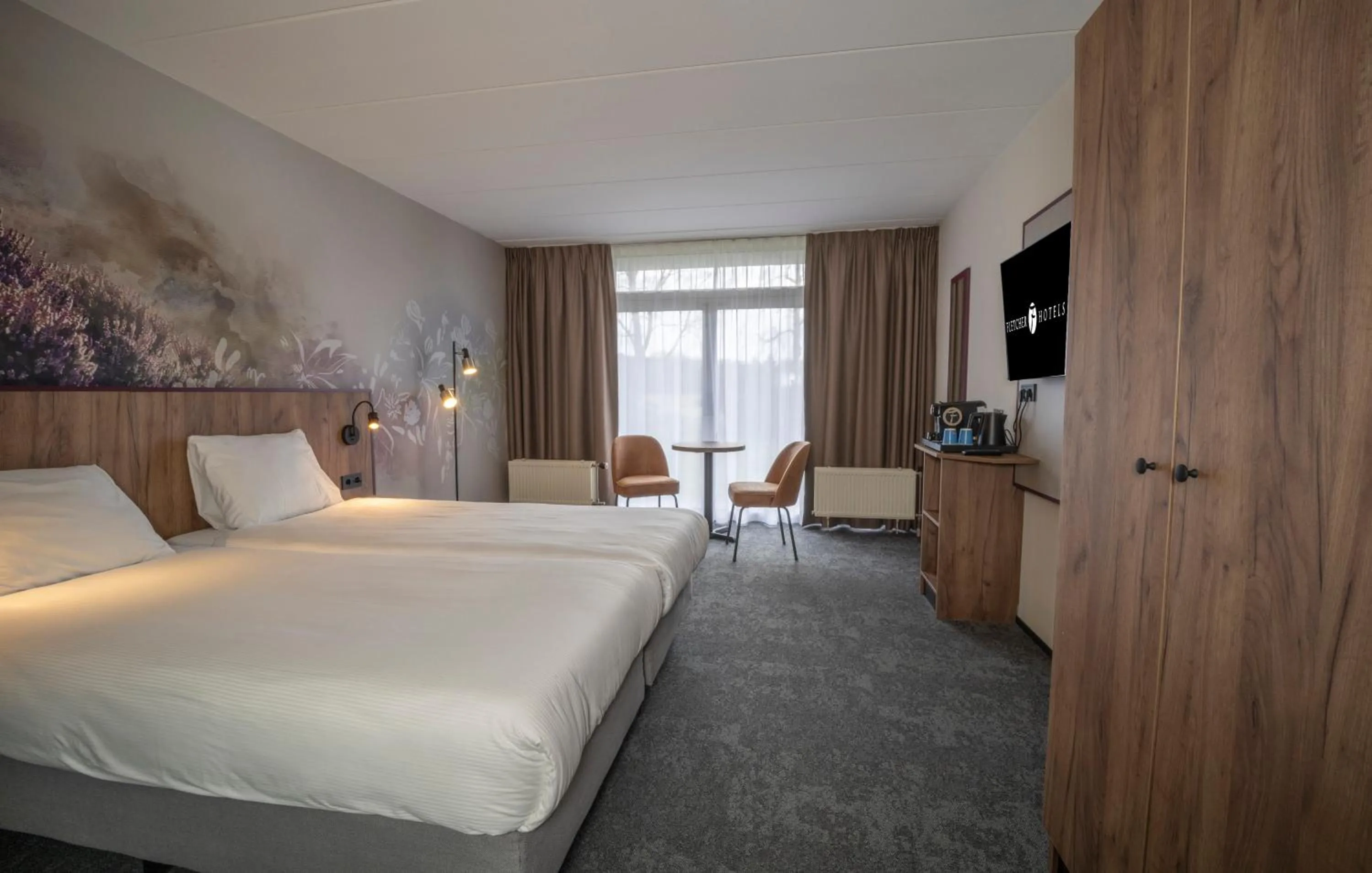 Photo of the whole room, Bed in Fletcher Hotel - Restaurant de Zeegser Duinen