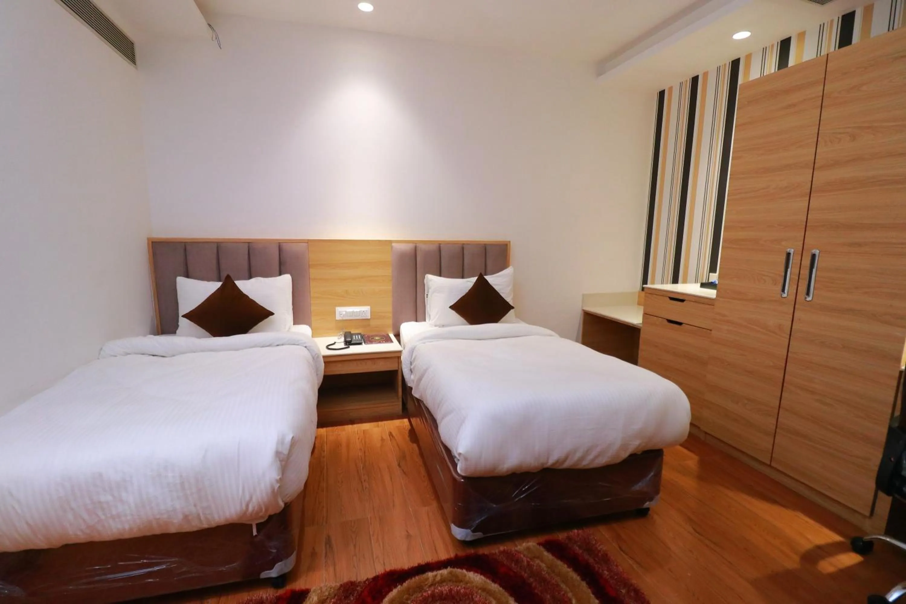 Bed in Country Green Hotel & Banquet