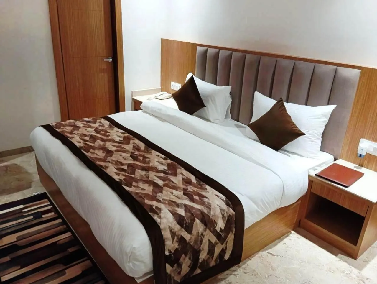 Bedroom in Country Green Hotel & Banquet